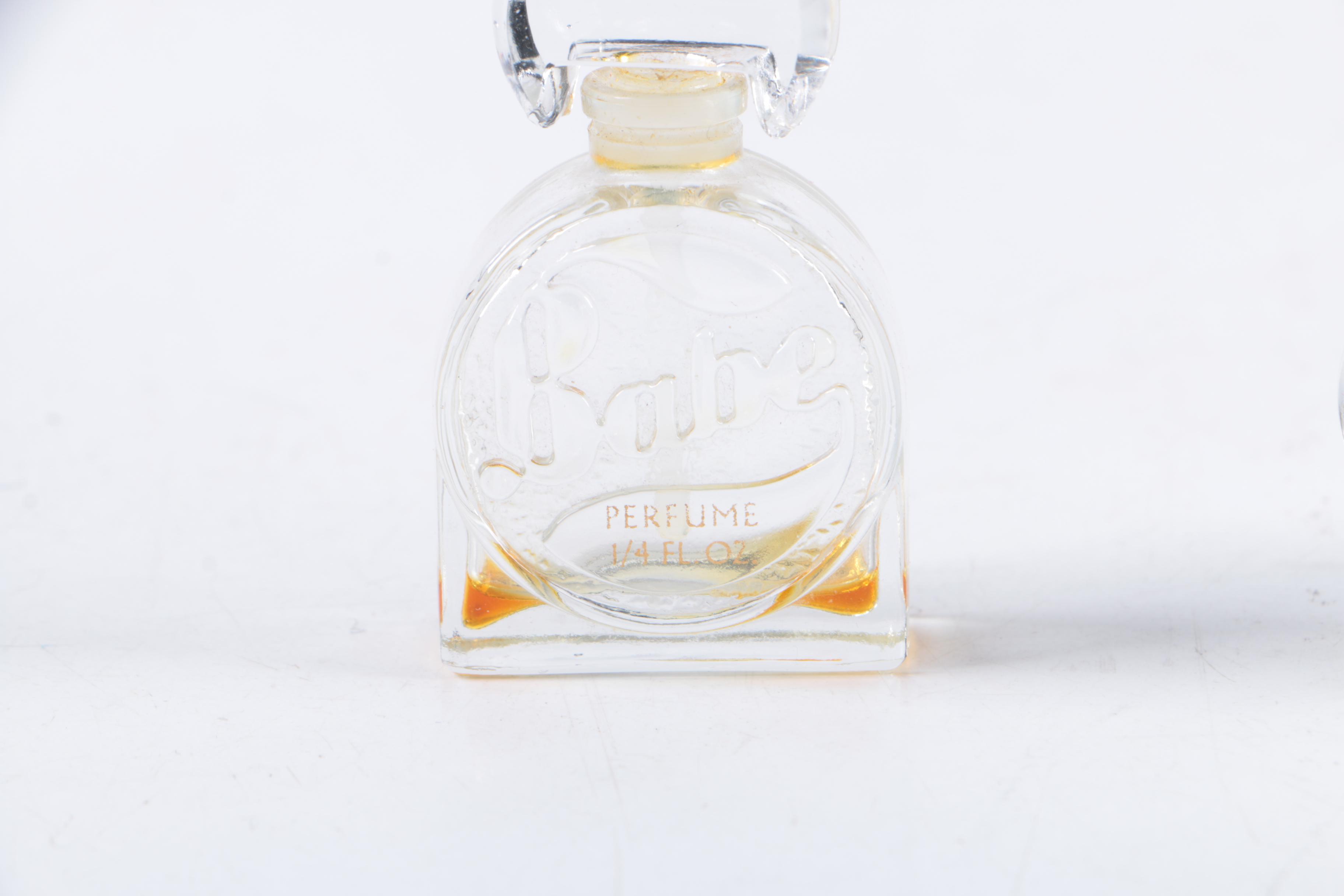 Perfume Bottles and Lipstick Cases including Oscar de la Renta