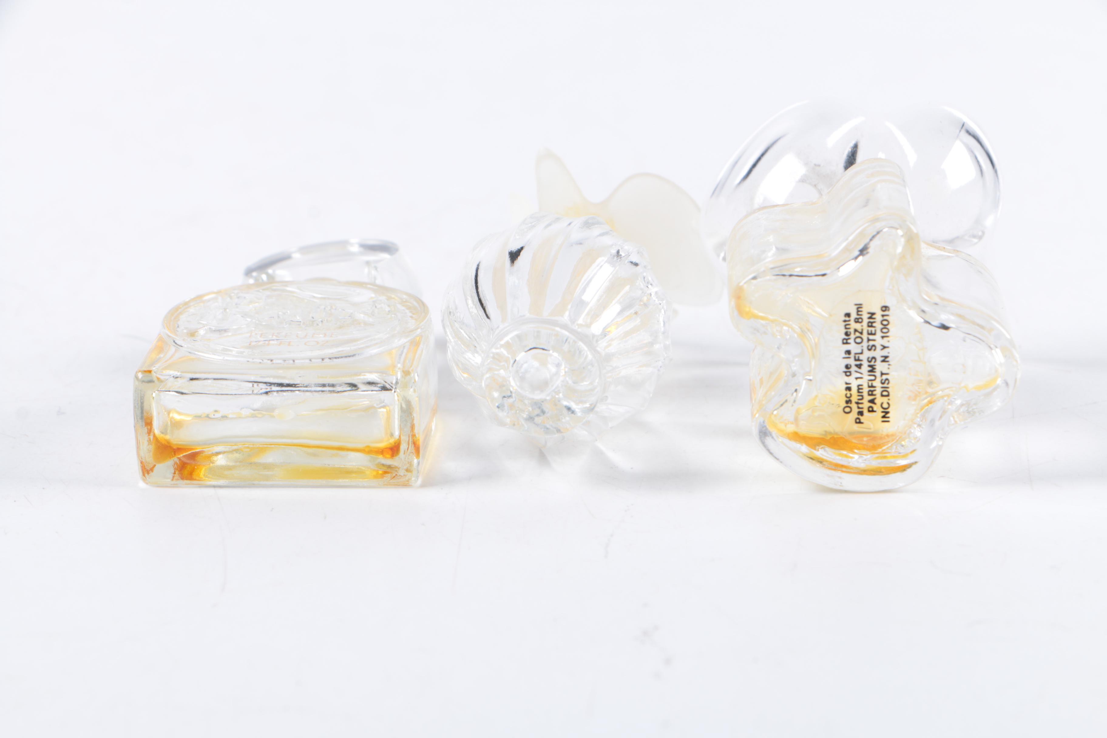 Perfume Bottles and Lipstick Cases including Oscar de la Renta