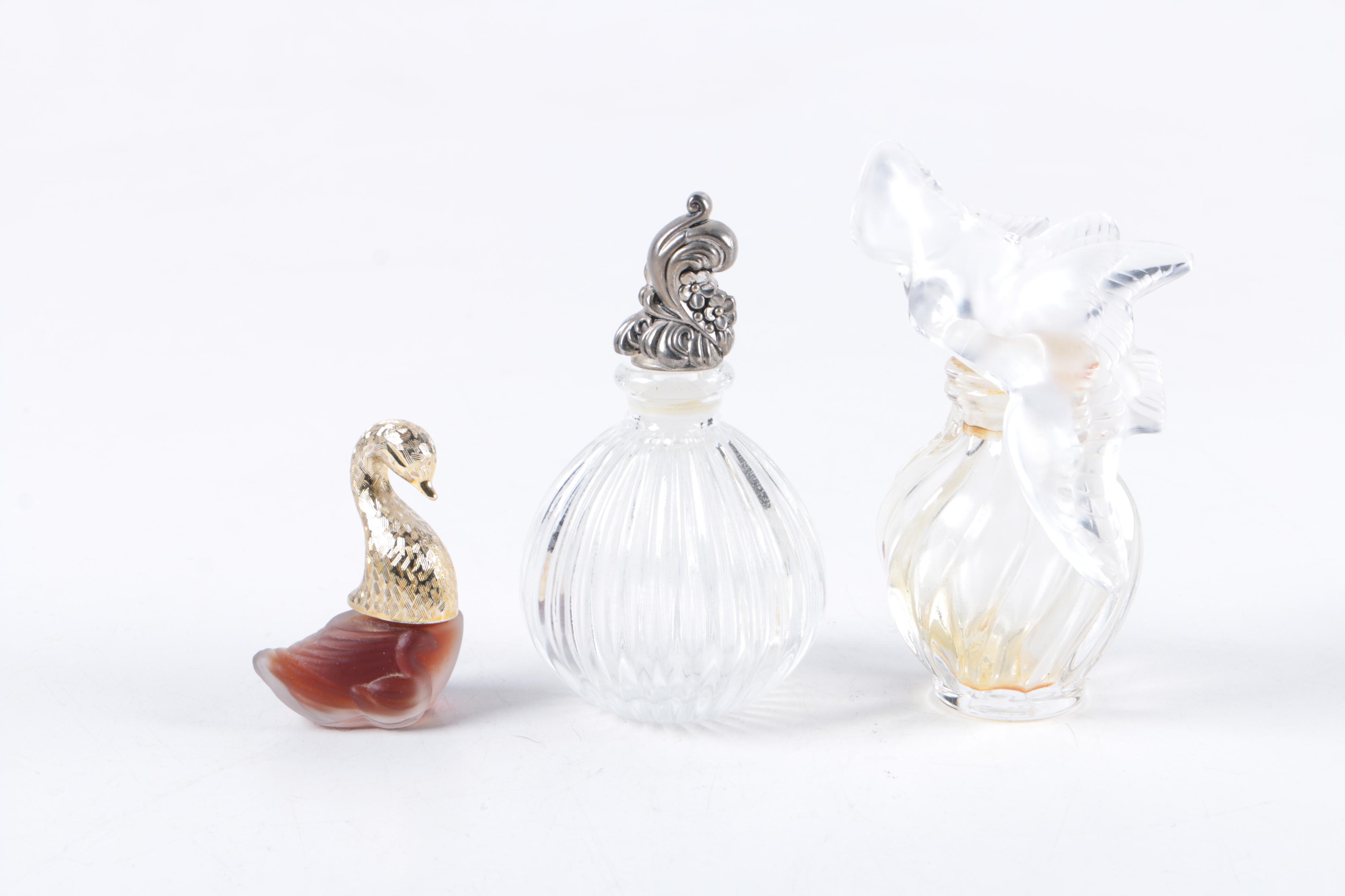 Perfume Bottles and Lipstick Cases including Oscar de la Renta