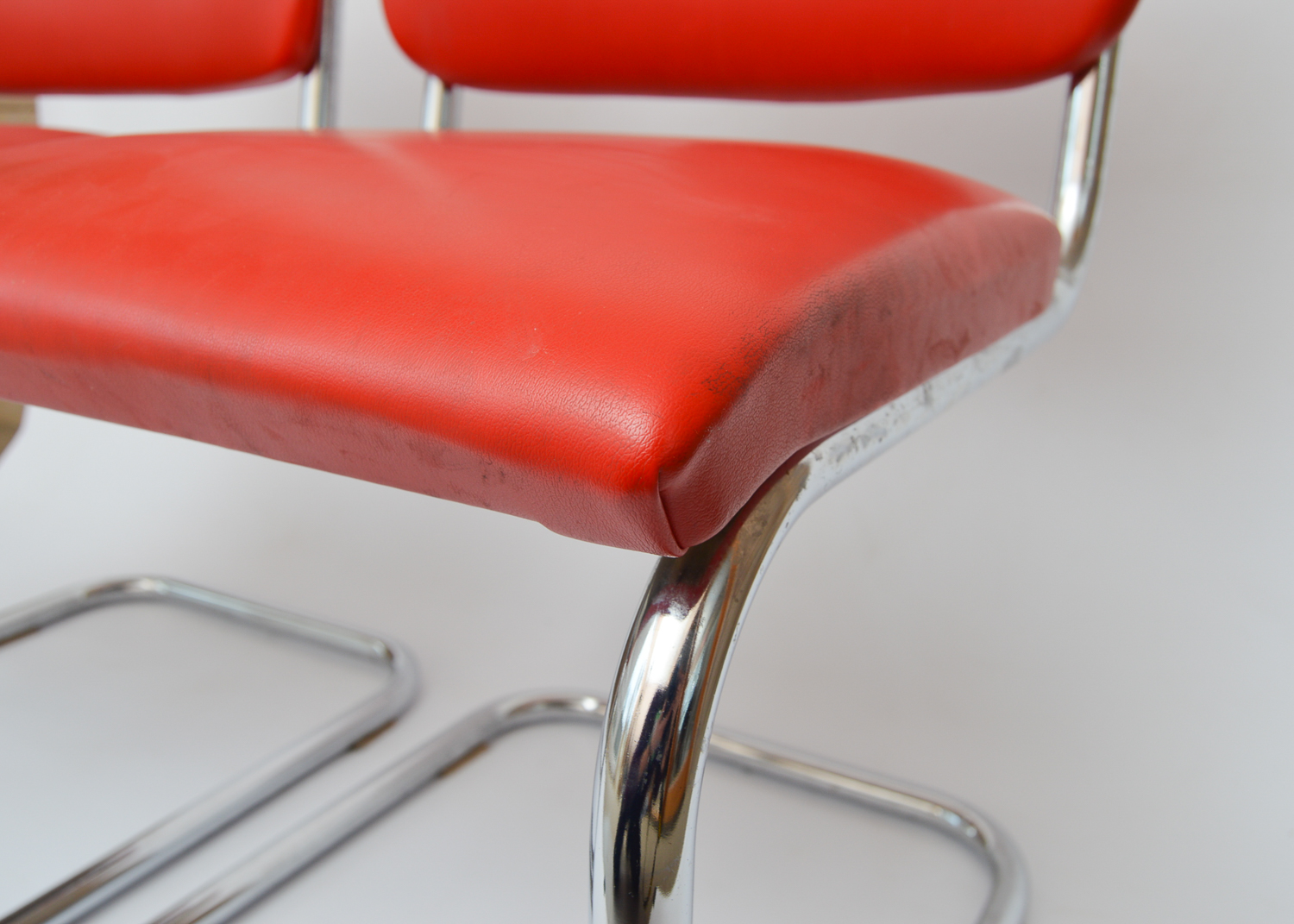 Red Vinyl Upholstered Cesca Style Chair Pair
