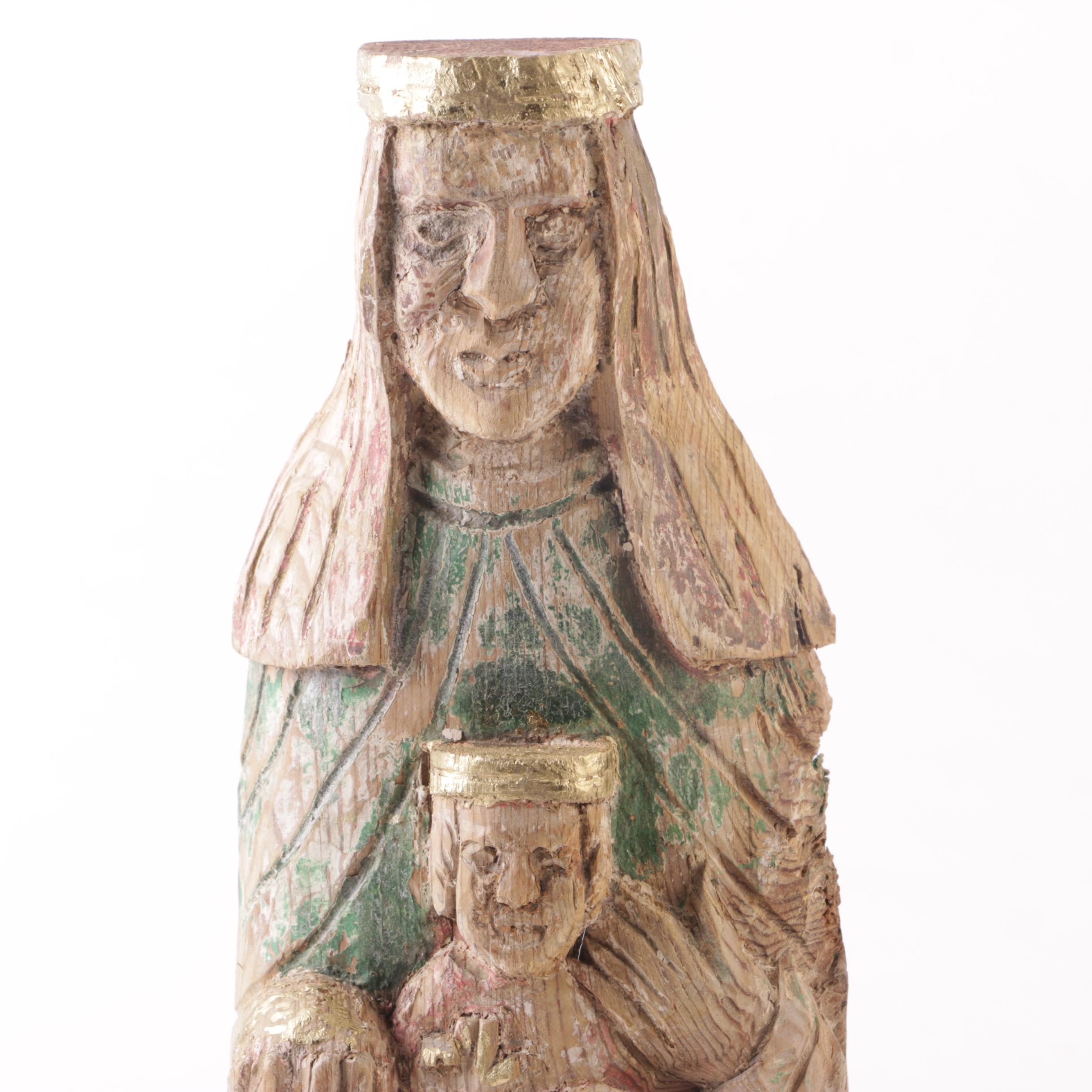 Carved Santos Figurine