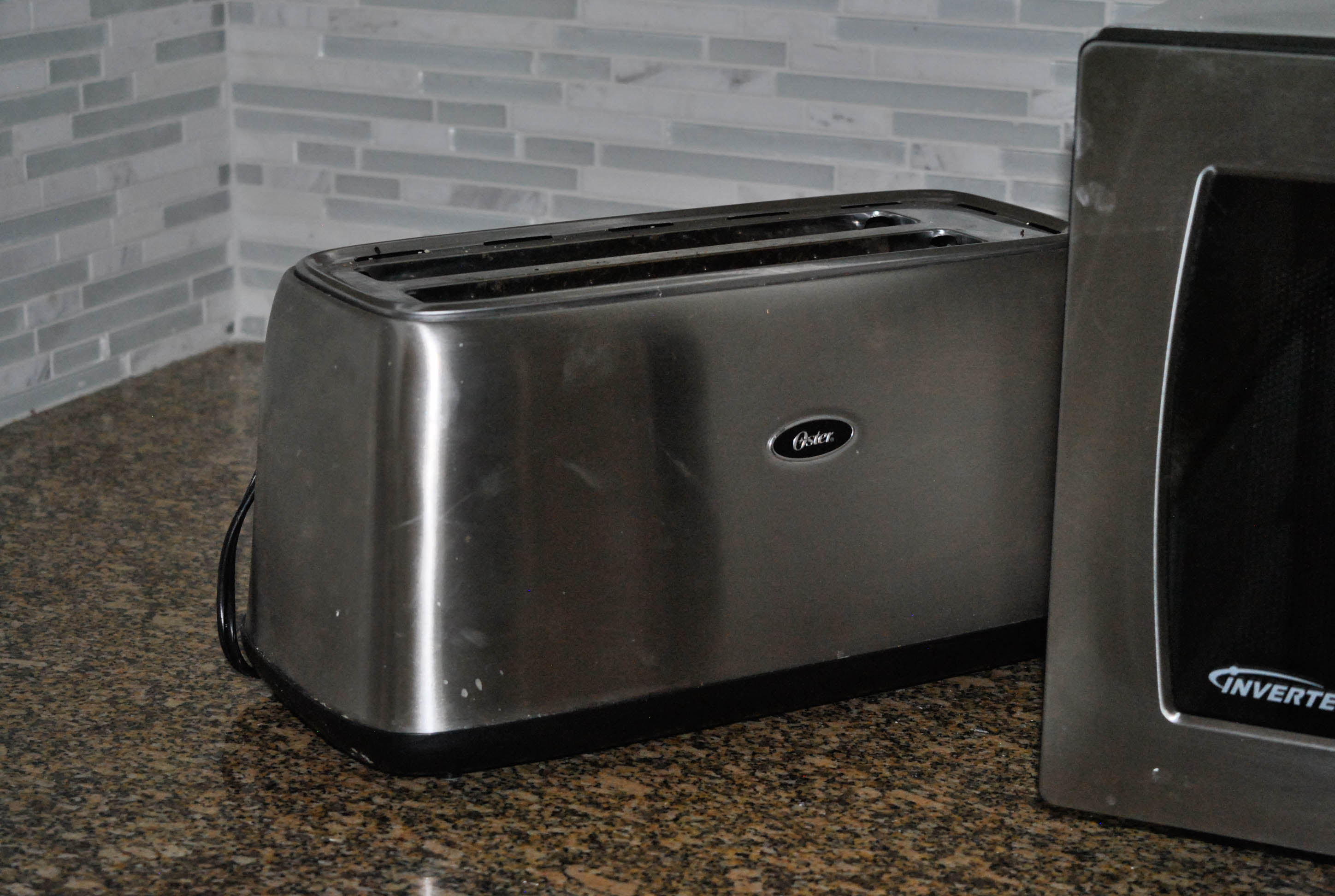 Panasonic "Genius Prestige" Microwave and Oster Toaster