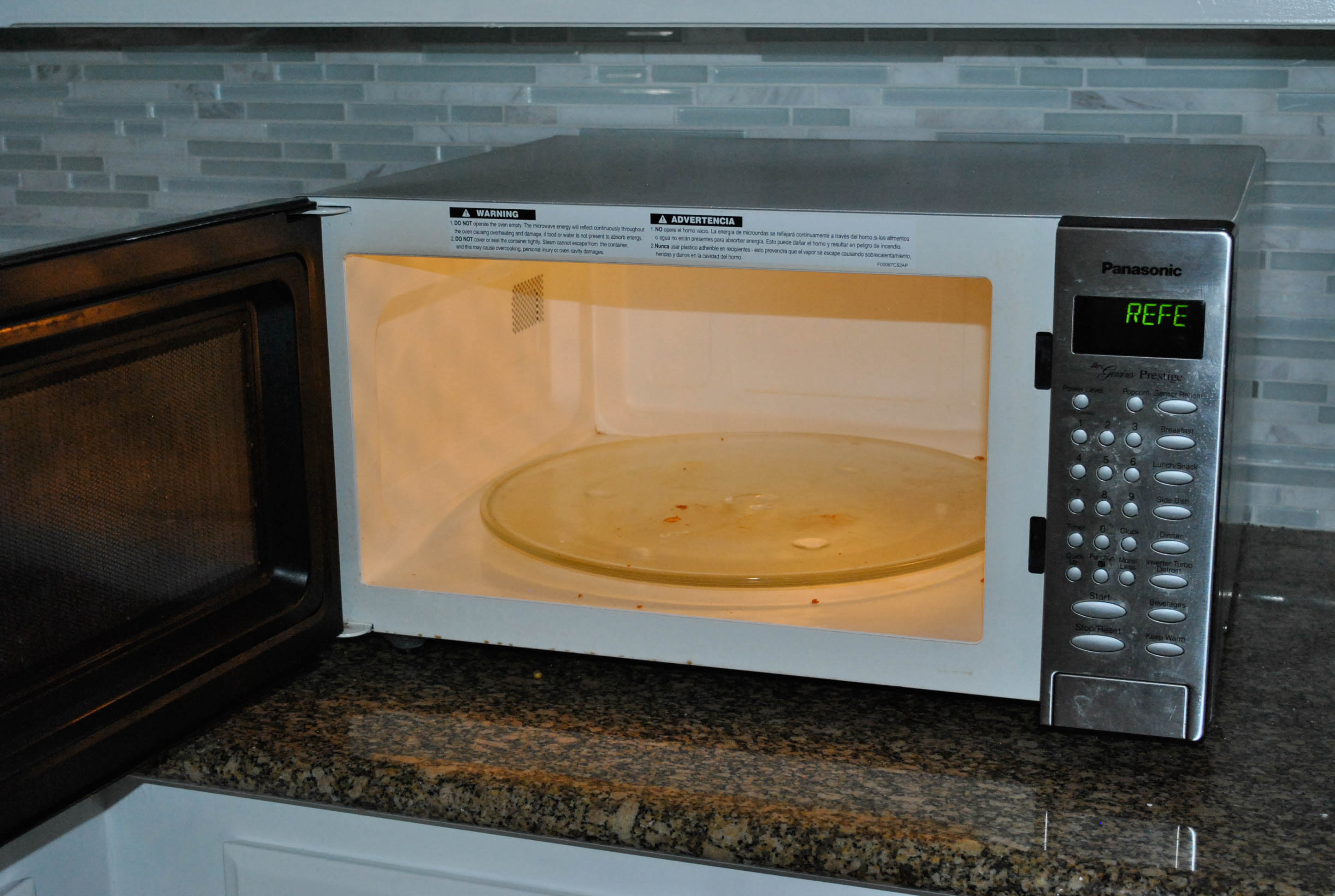 Panasonic "Genius Prestige" Microwave and Oster Toaster