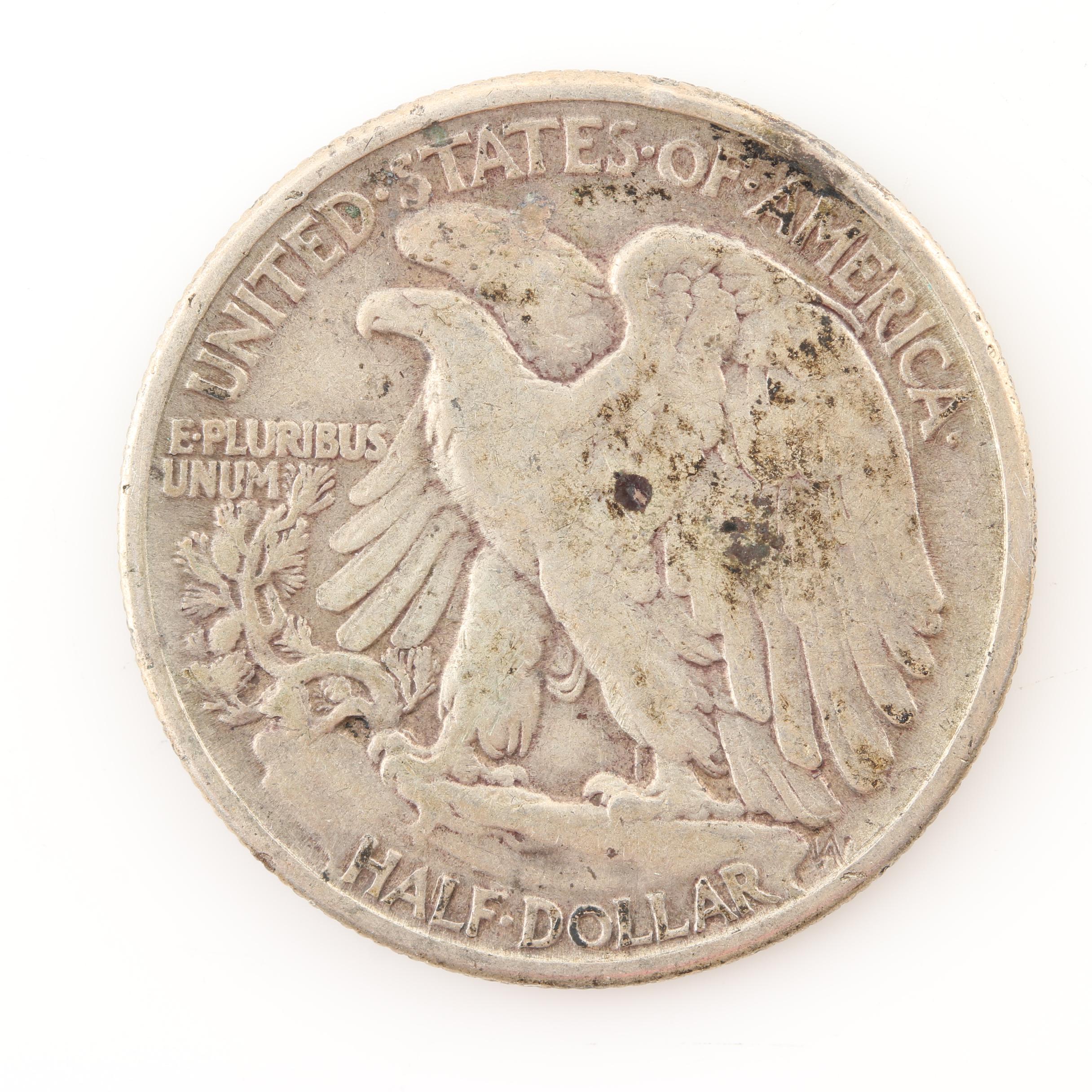 Fourteen Vintage U.S. Silver Half Dollars