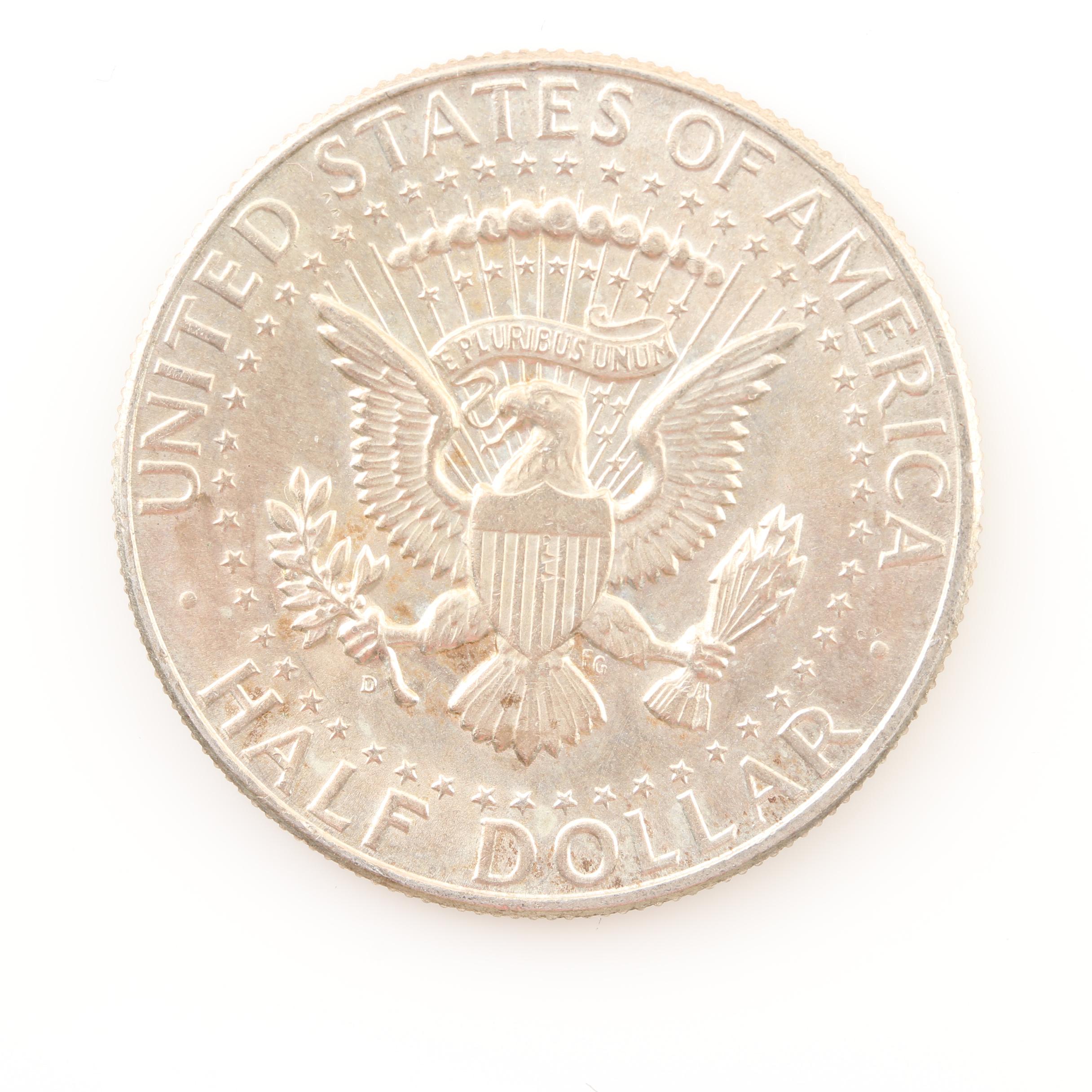 Fourteen Vintage U.S. Silver Half Dollars