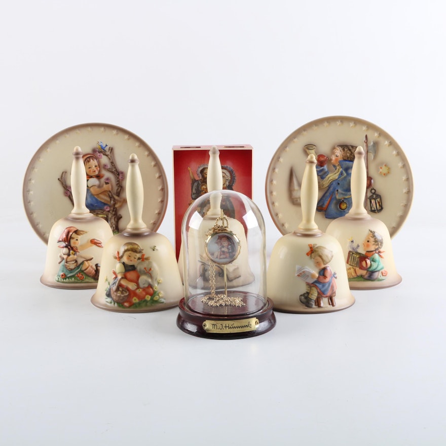 Collection of Hummel Plates, Bells, Music Box, and Hanging Watch in Glass Case