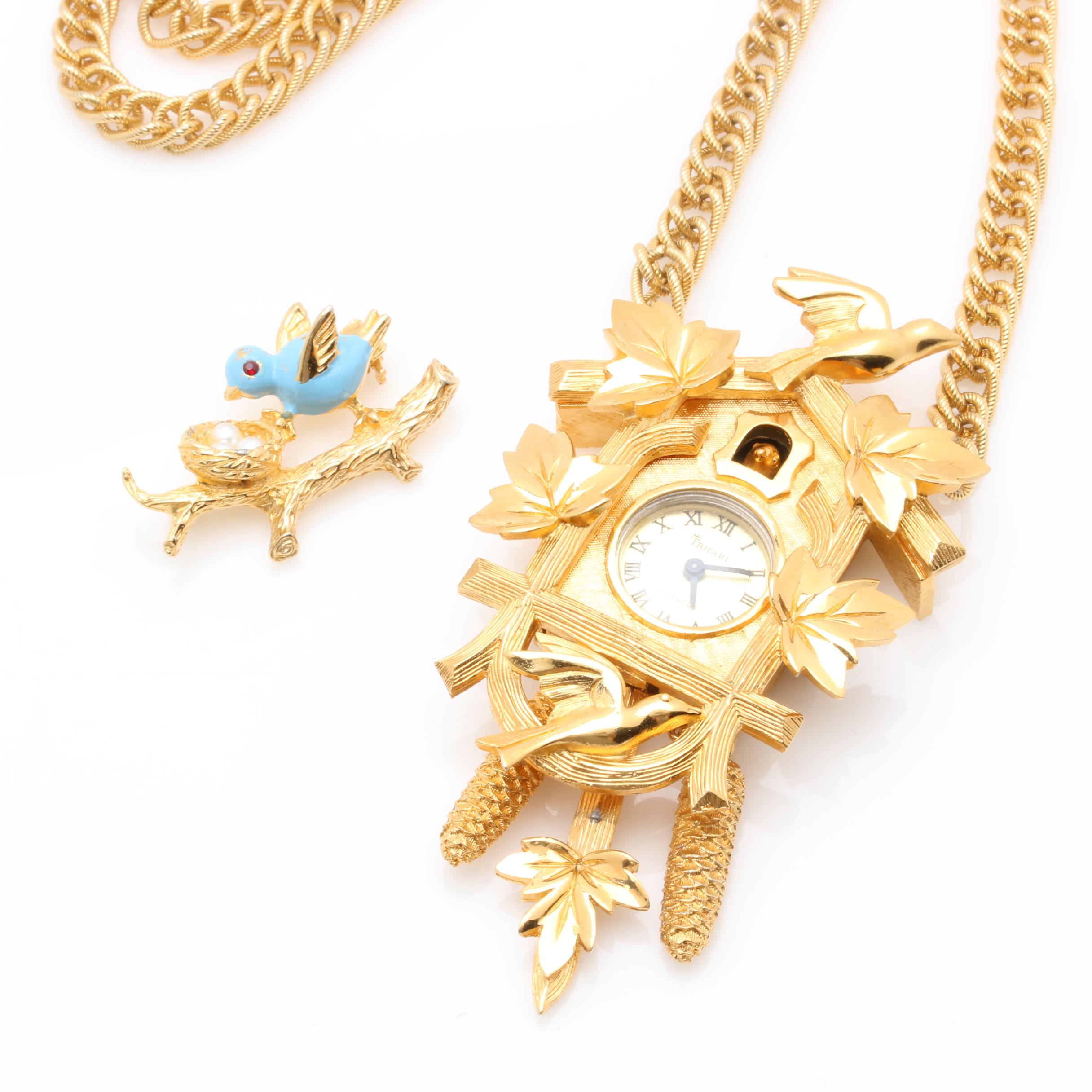 Gold-Tone Cuckcoo Clock Necklace and Bluebird Brooch Featuring Trifari