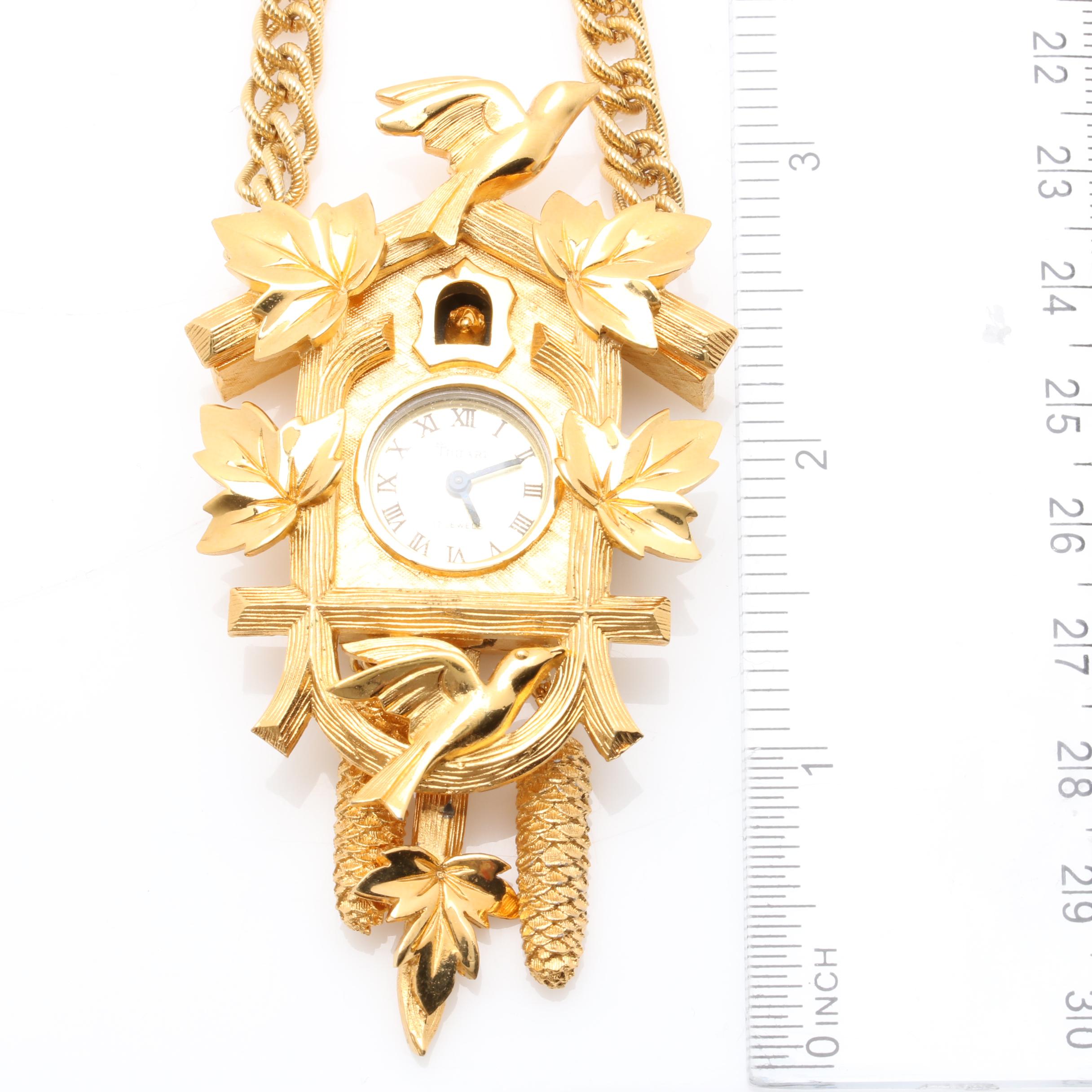 Gold-Tone Cuckcoo Clock Necklace and Bluebird Brooch Featuring Trifari