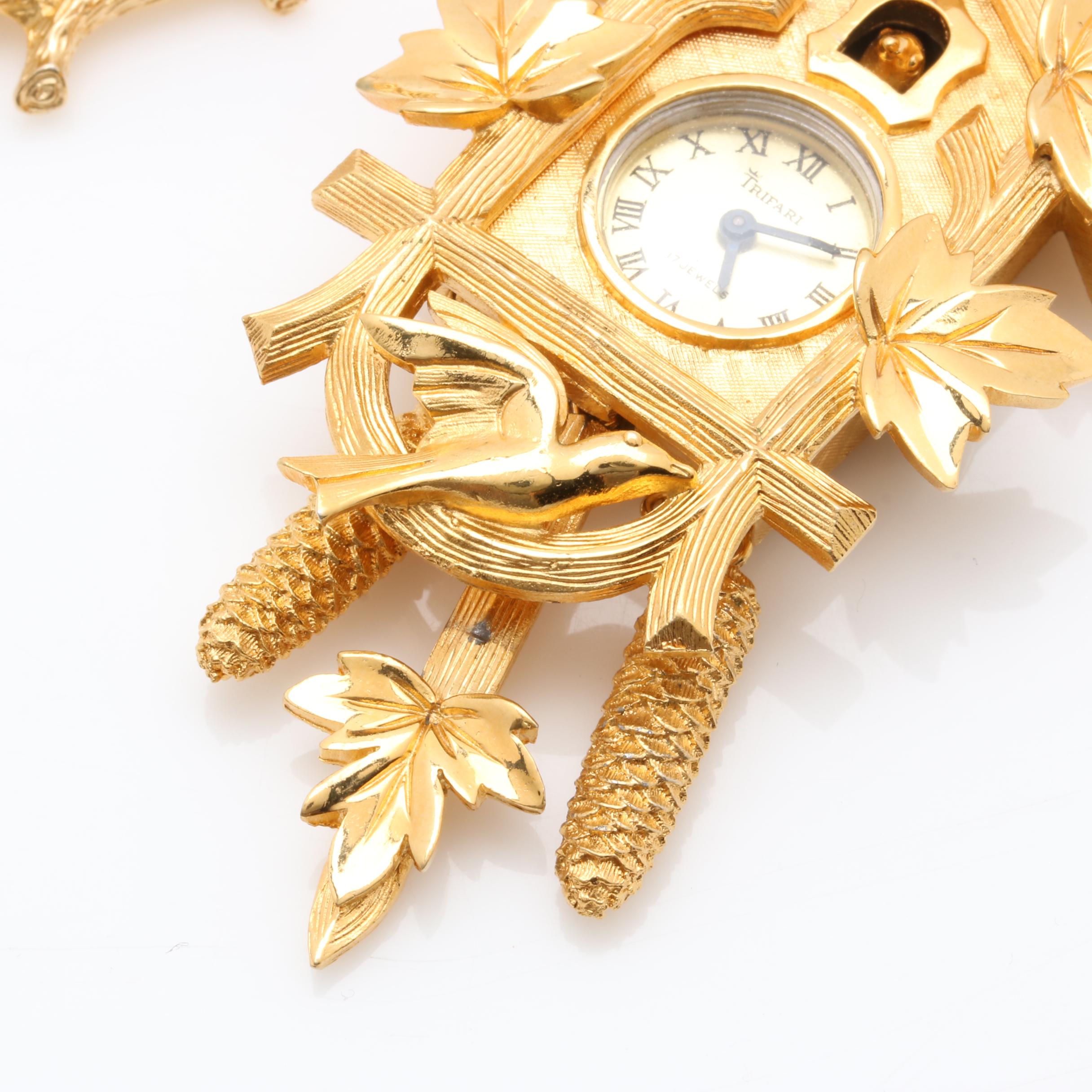 Gold-Tone Cuckcoo Clock Necklace and Bluebird Brooch Featuring Trifari