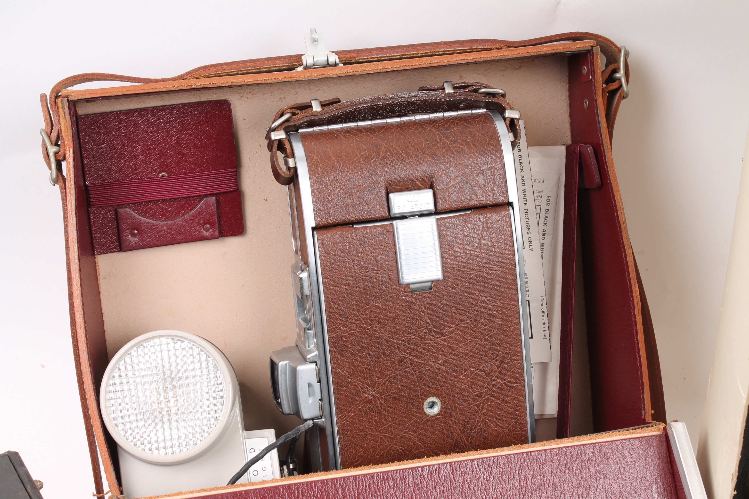 Polaroid and Yashica Cameras and Tasco Telescope