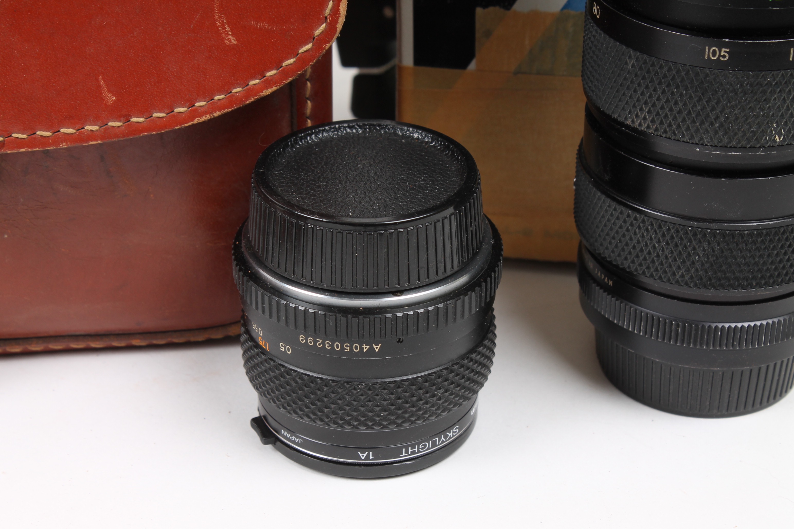 Polaroid and Yashica Cameras and Tasco Telescope