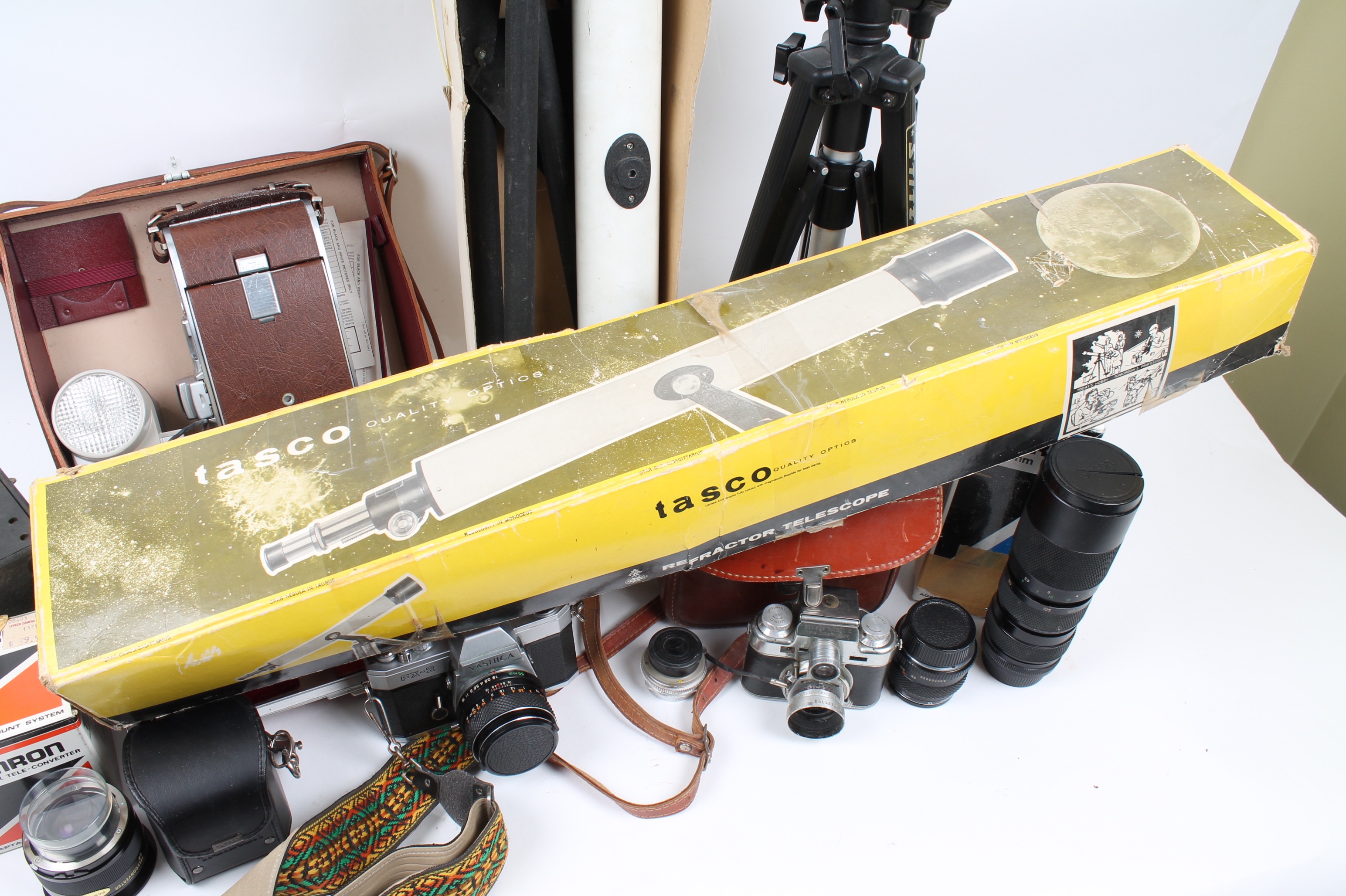 Polaroid and Yashica Cameras and Tasco Telescope