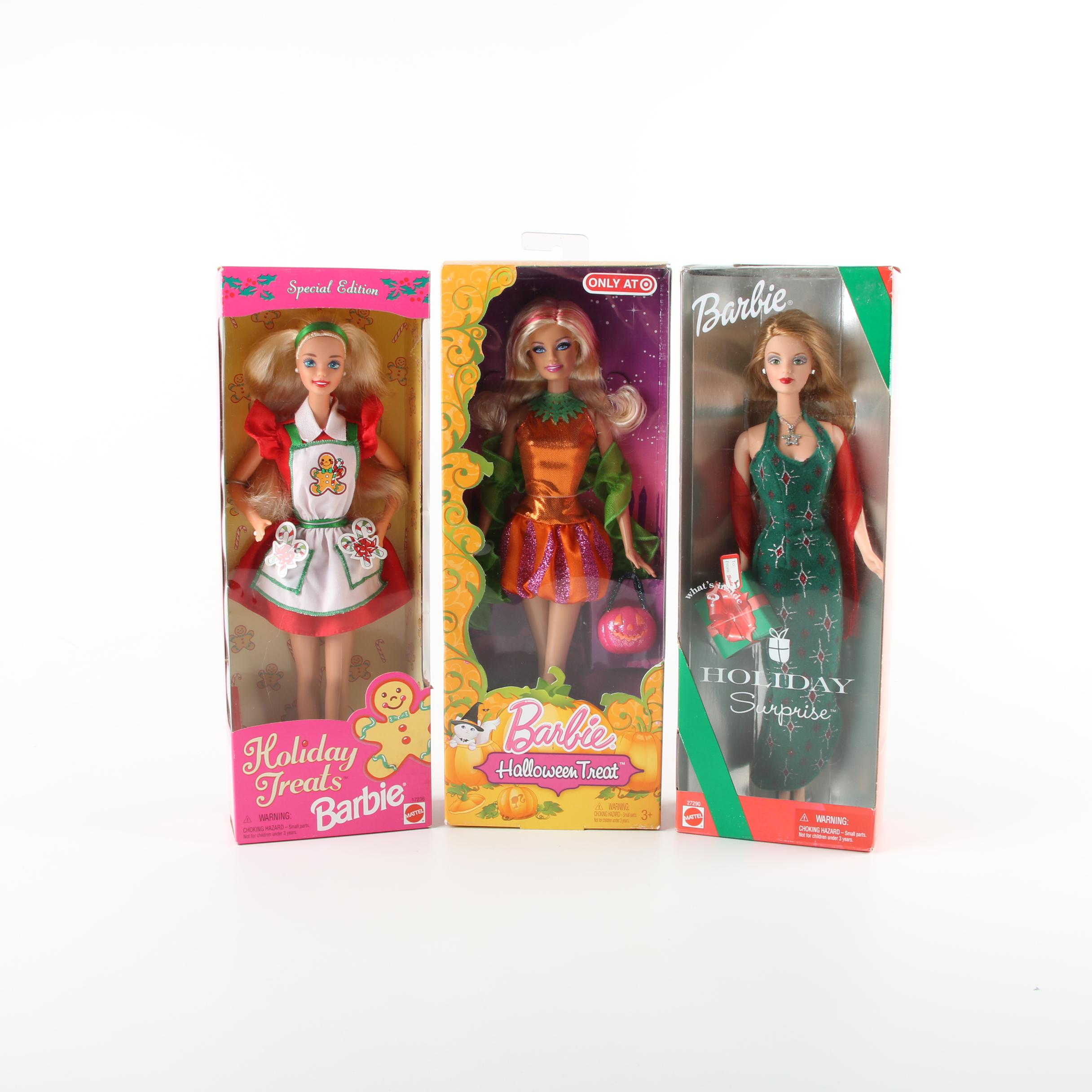 Nine Holiday Themed Barbie Dolls