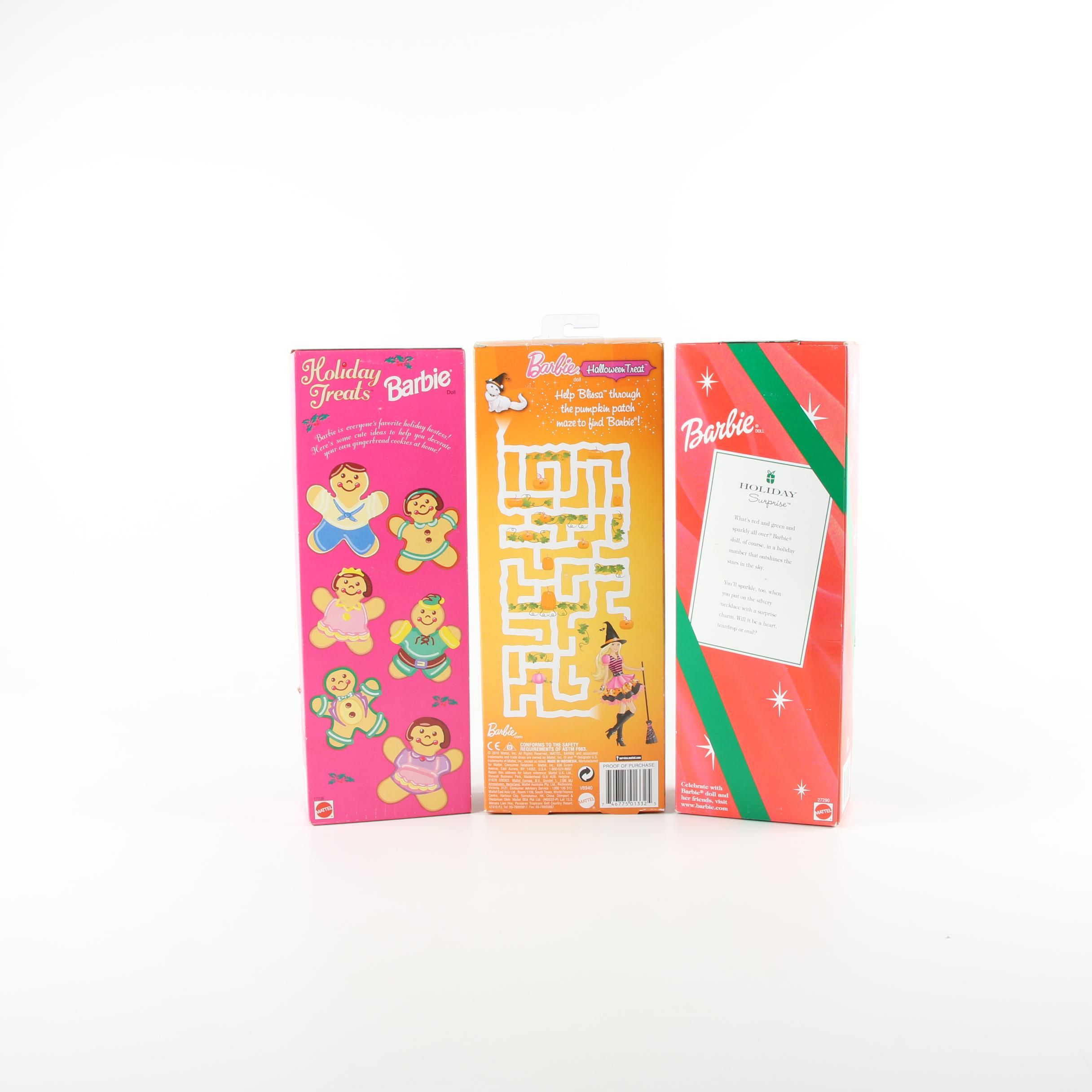 Nine Holiday Themed Barbie Dolls