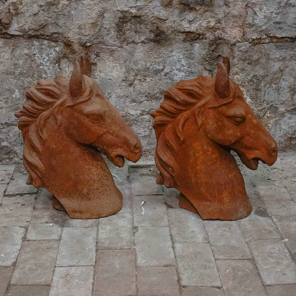 Pair of Iron Horse Heads With Flowing Manes