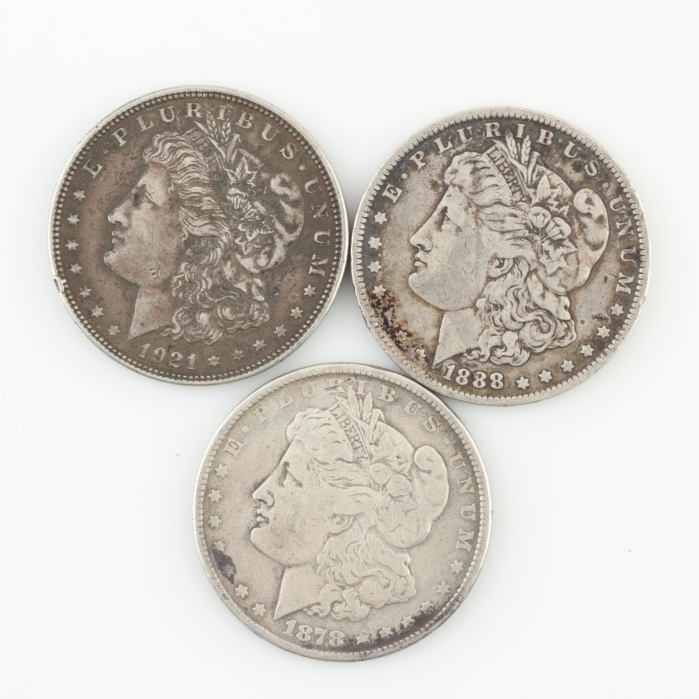 Group of Three Silver Morgan Dollars Including 1878, 1888, and 1921