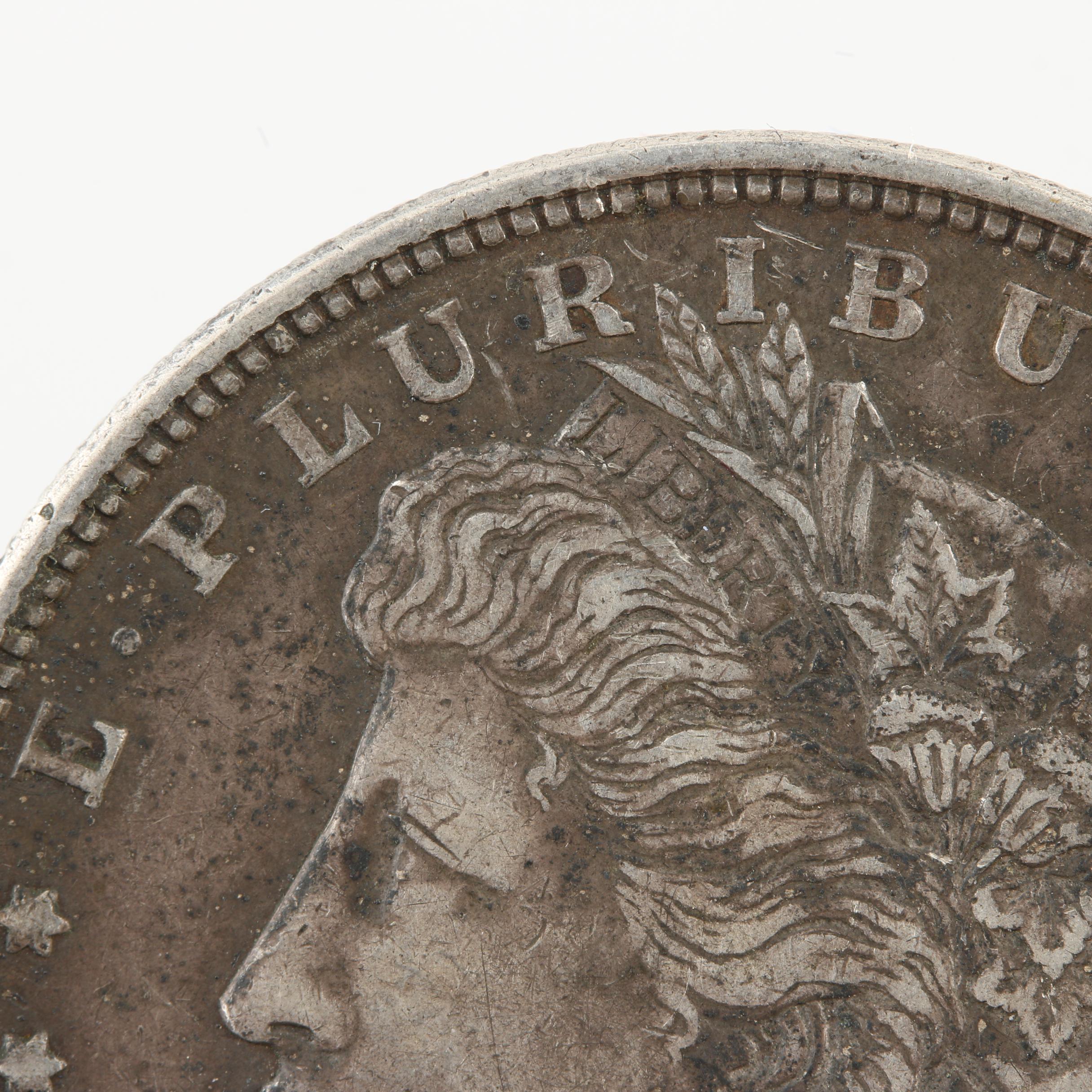 Group of Three Silver Morgan Dollars Including 1878, 1888, and 1921