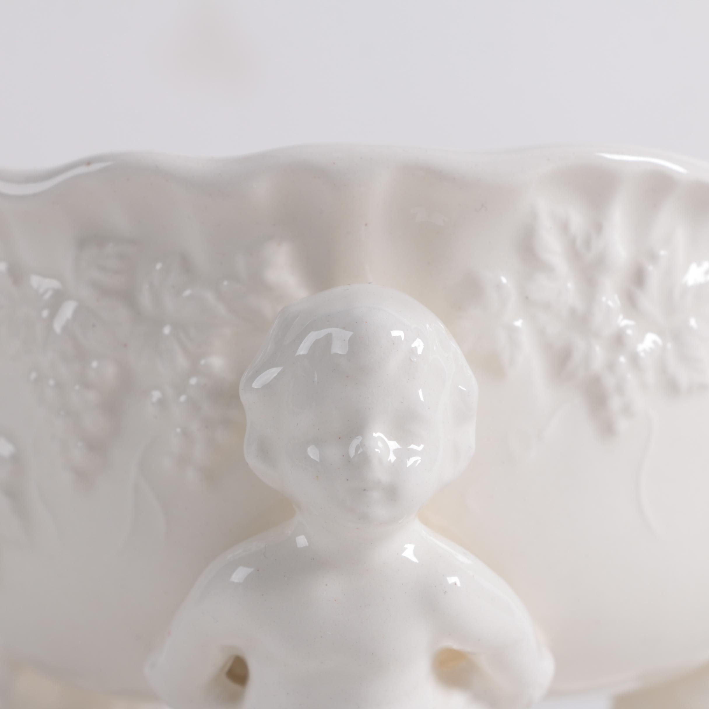 Ornate Ceramic Pitcher and Putti Bowl