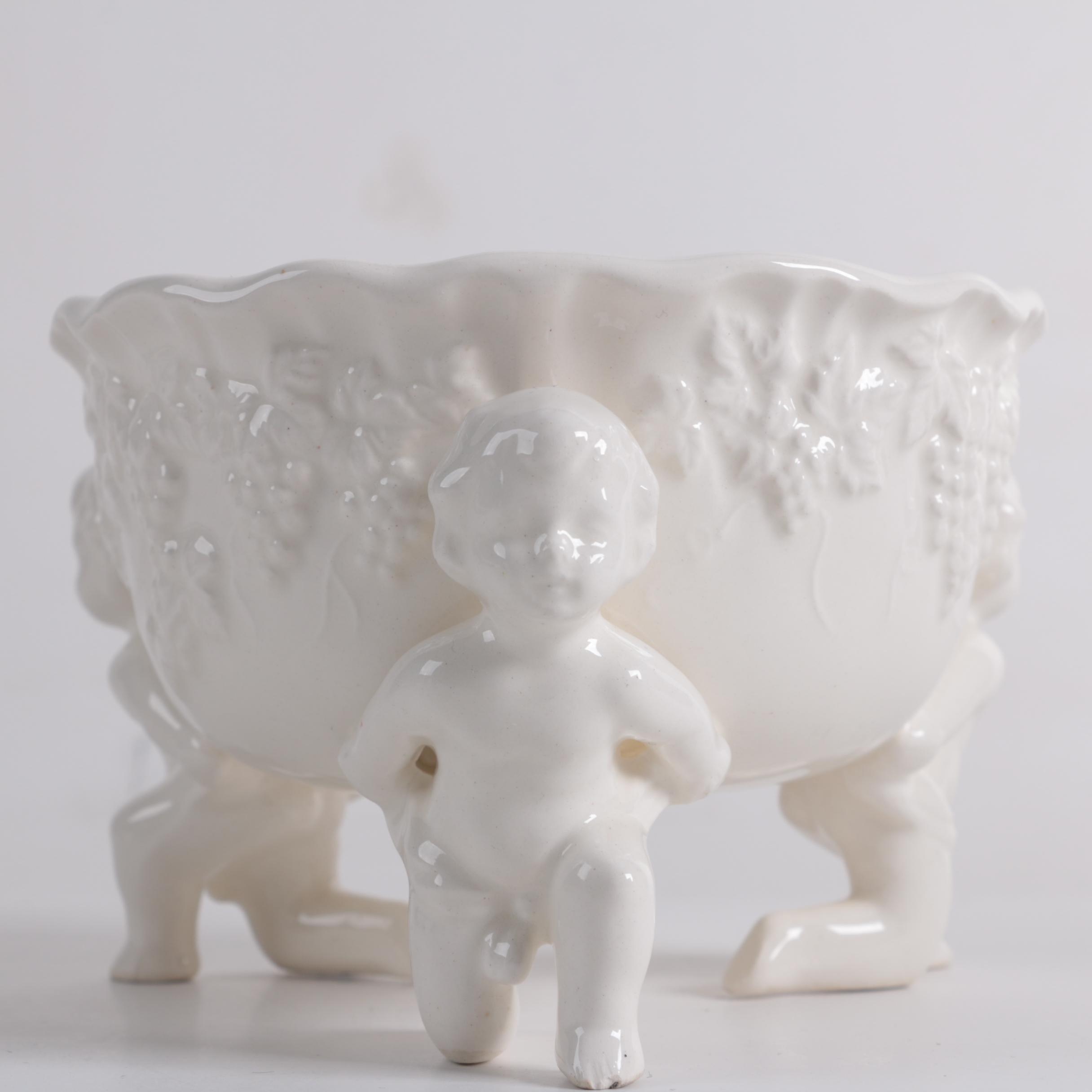 Ornate Ceramic Pitcher and Putti Bowl