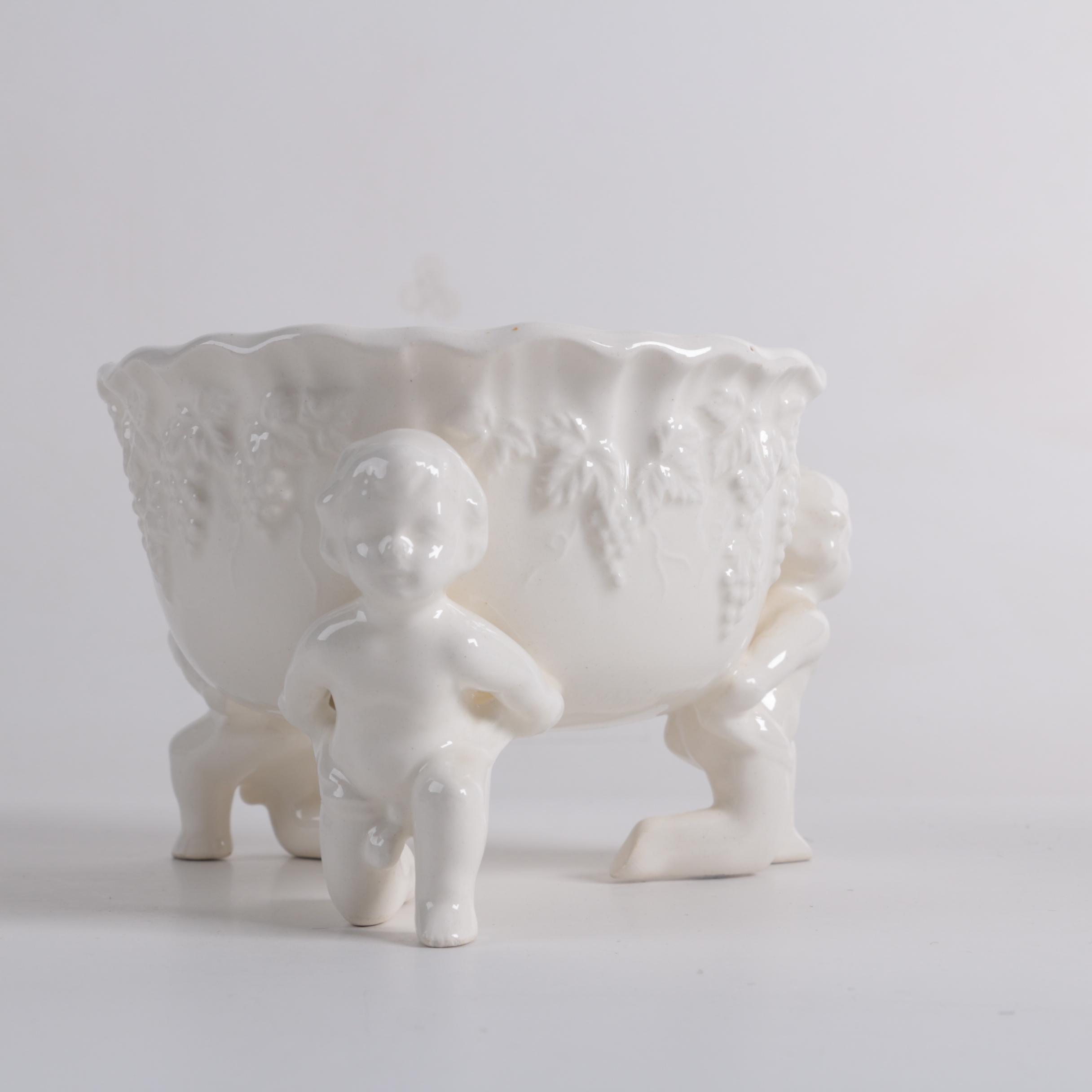 Ornate Ceramic Pitcher and Putti Bowl