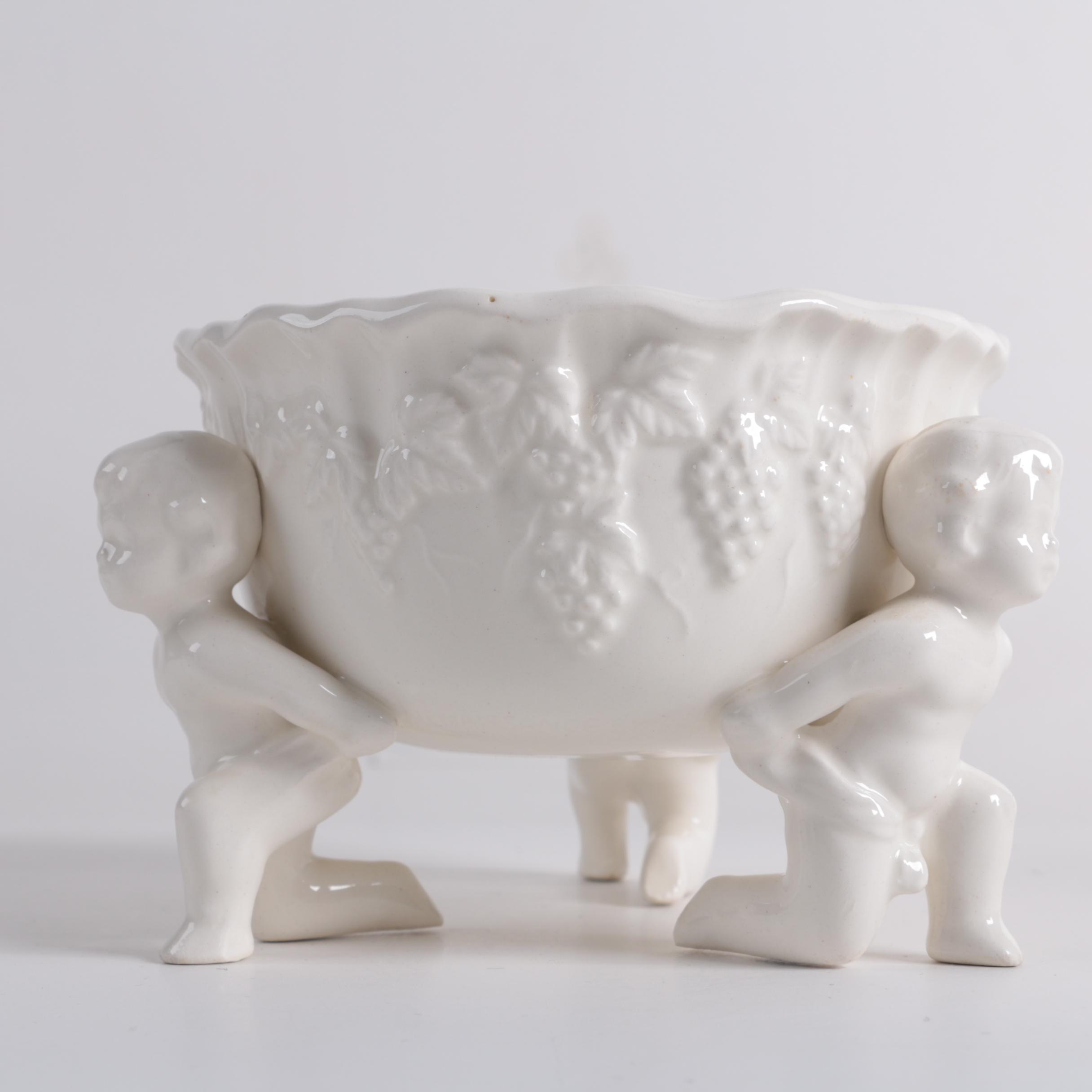 Ornate Ceramic Pitcher and Putti Bowl