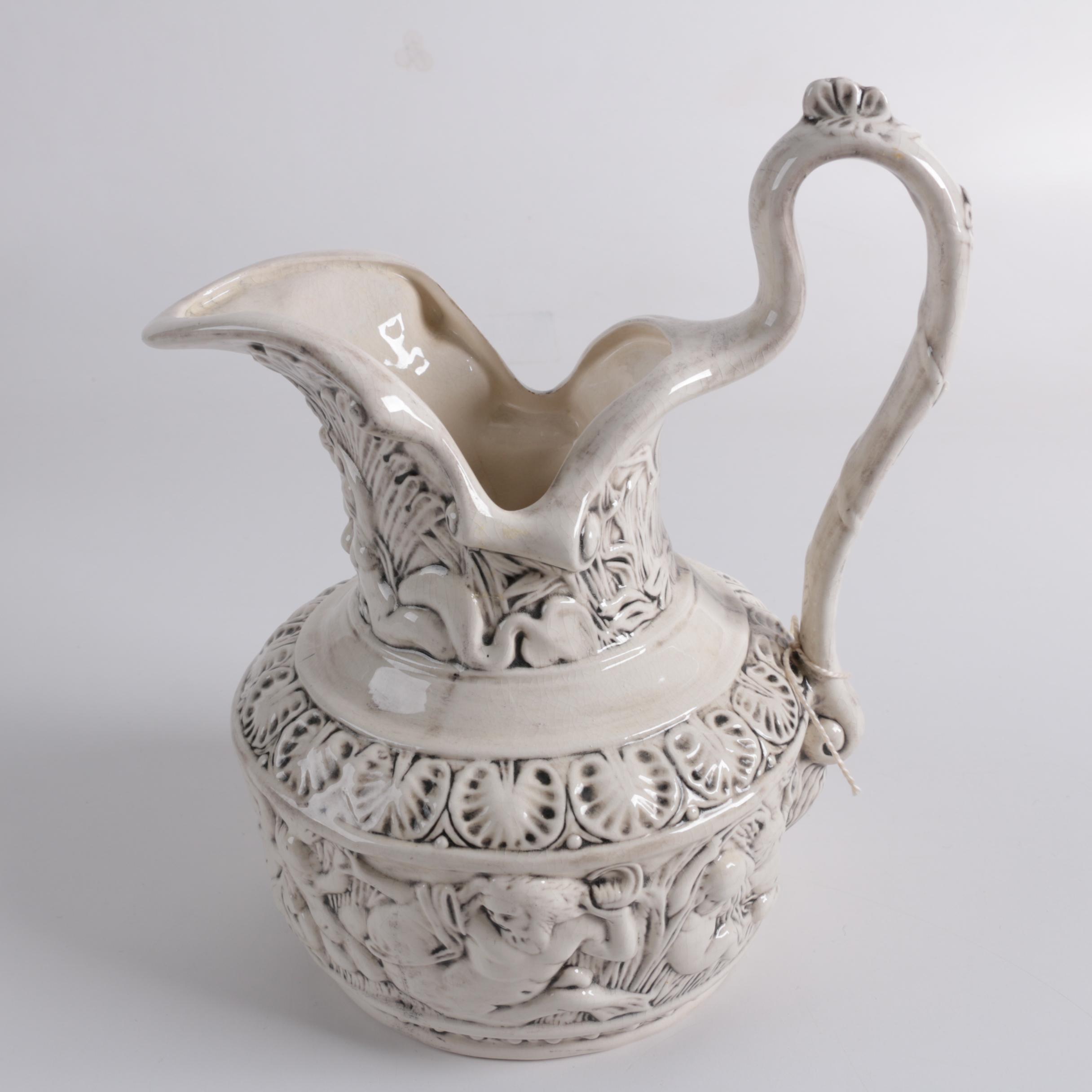 Ornate Ceramic Pitcher and Putti Bowl