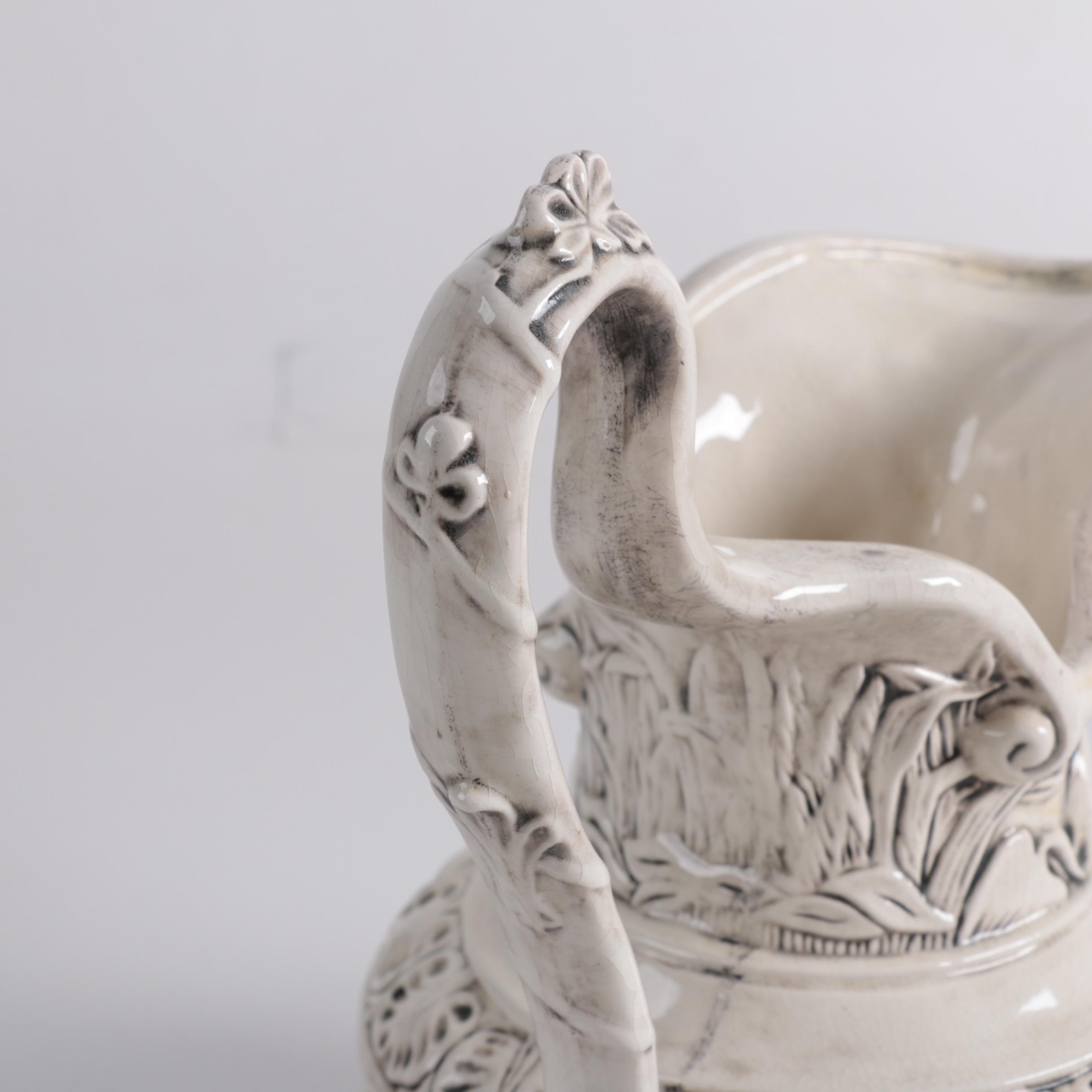 Ornate Ceramic Pitcher and Putti Bowl