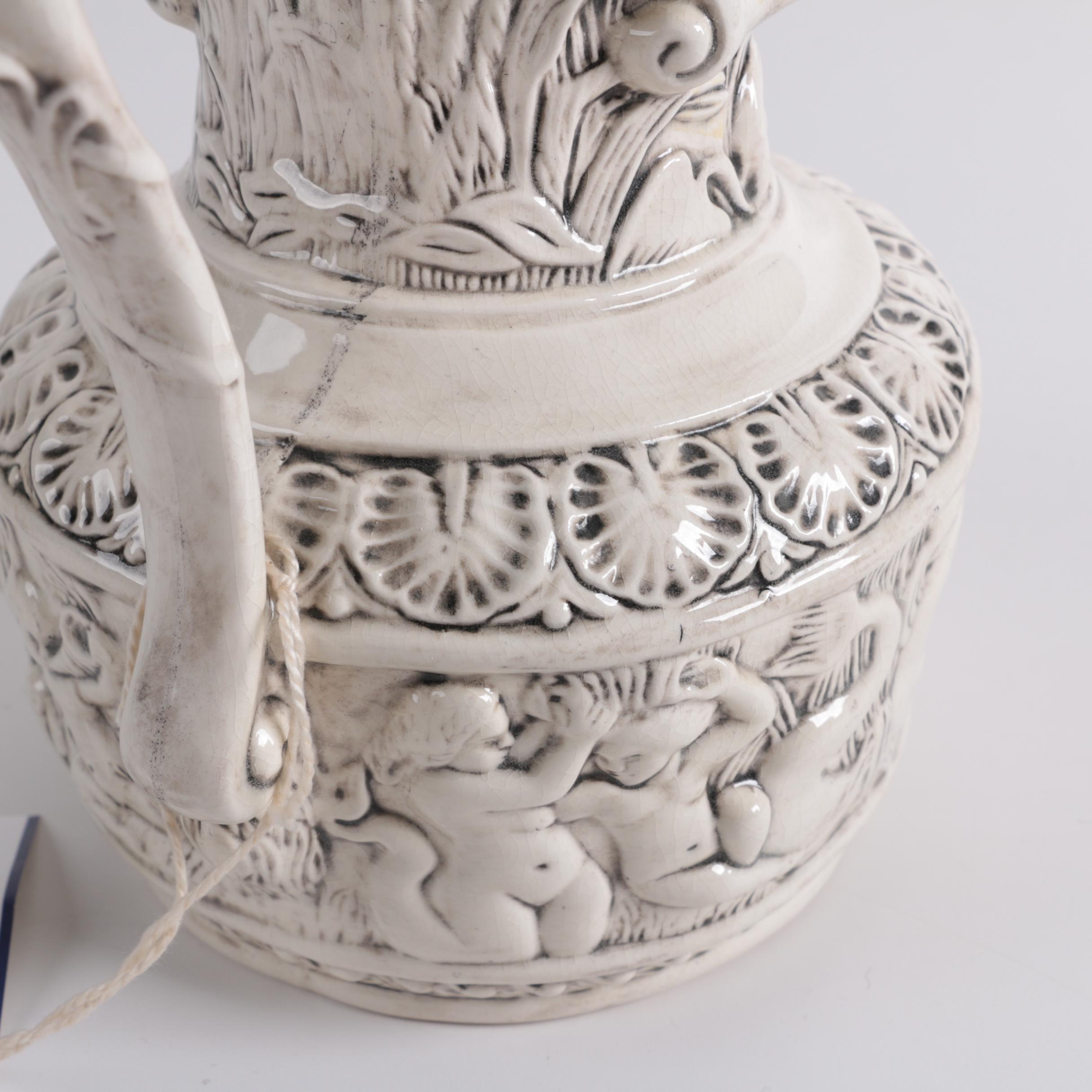 Ornate Ceramic Pitcher and Putti Bowl