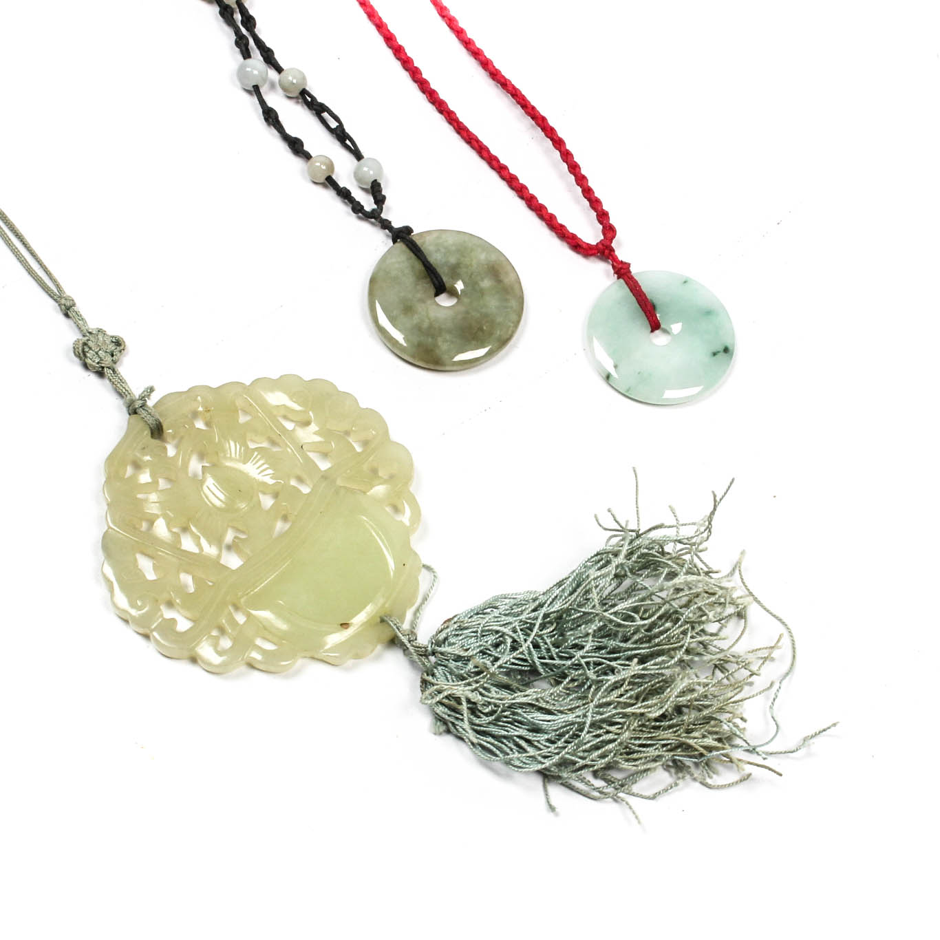 Pendants in Jade and Bowenite