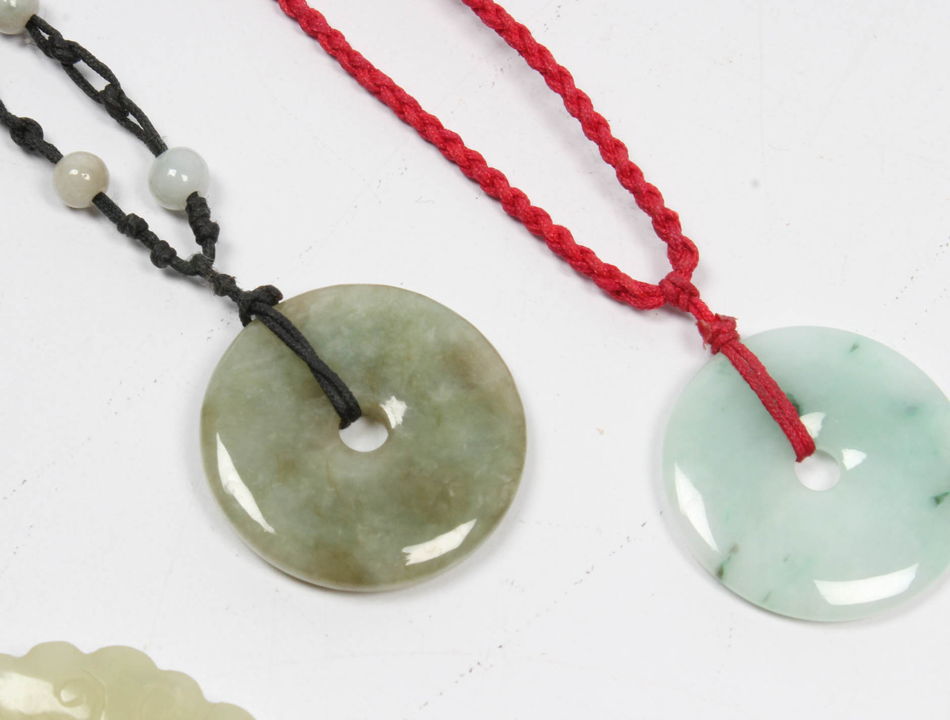 Pendants in Jade and Bowenite