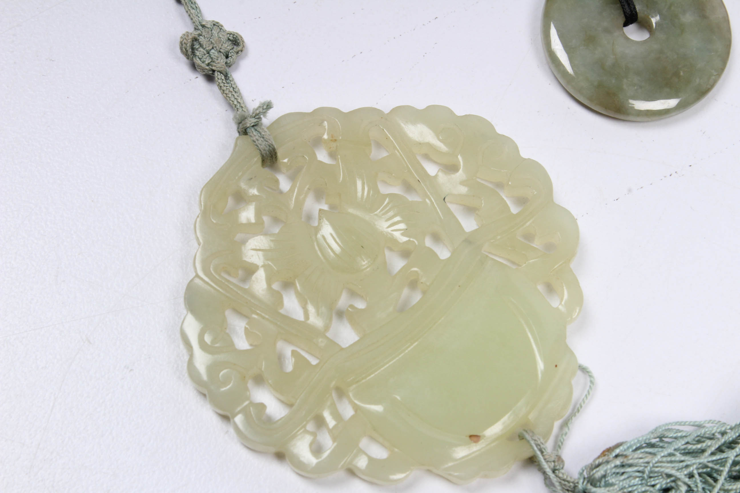 Pendants in Jade and Bowenite