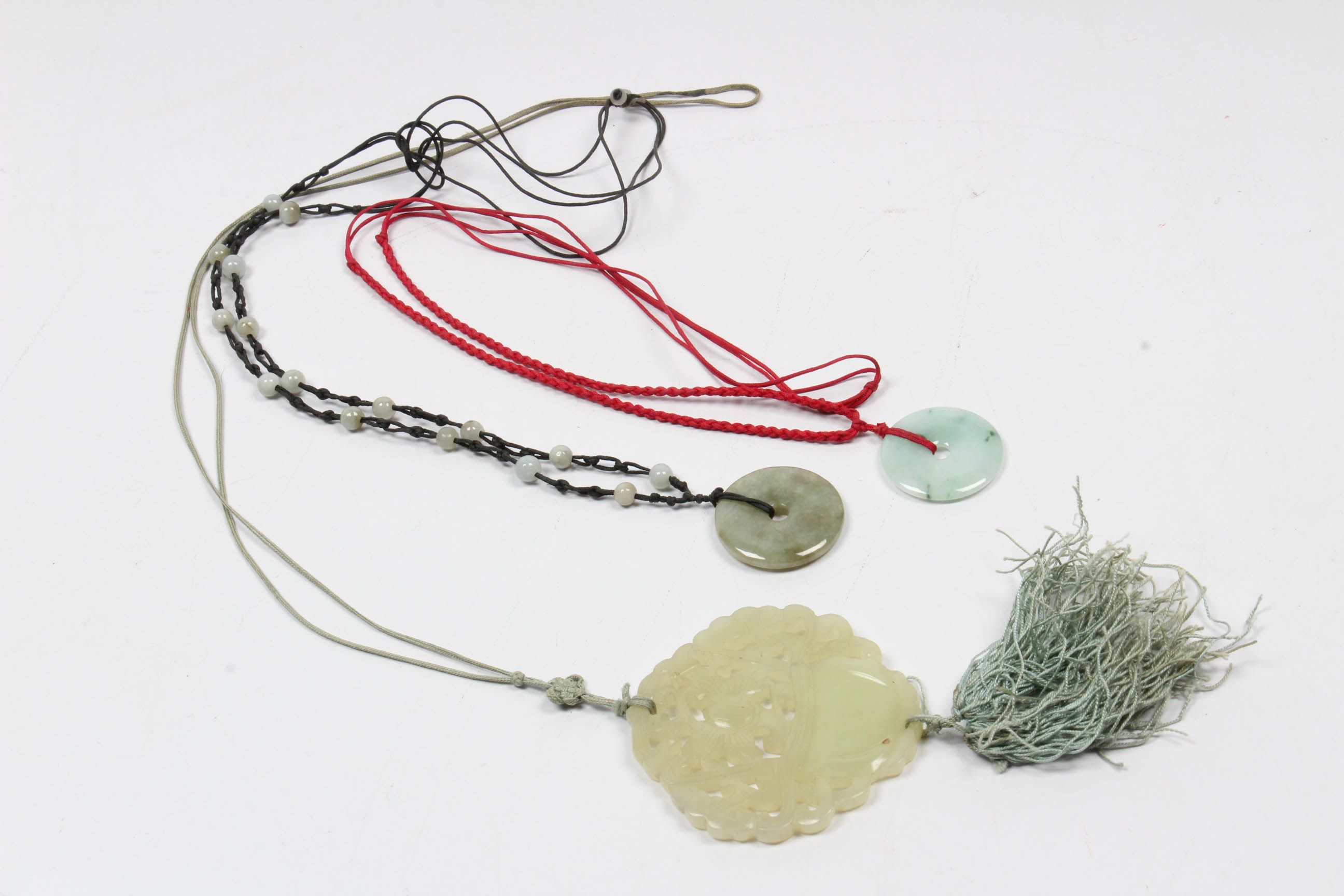 Pendants in Jade and Bowenite
