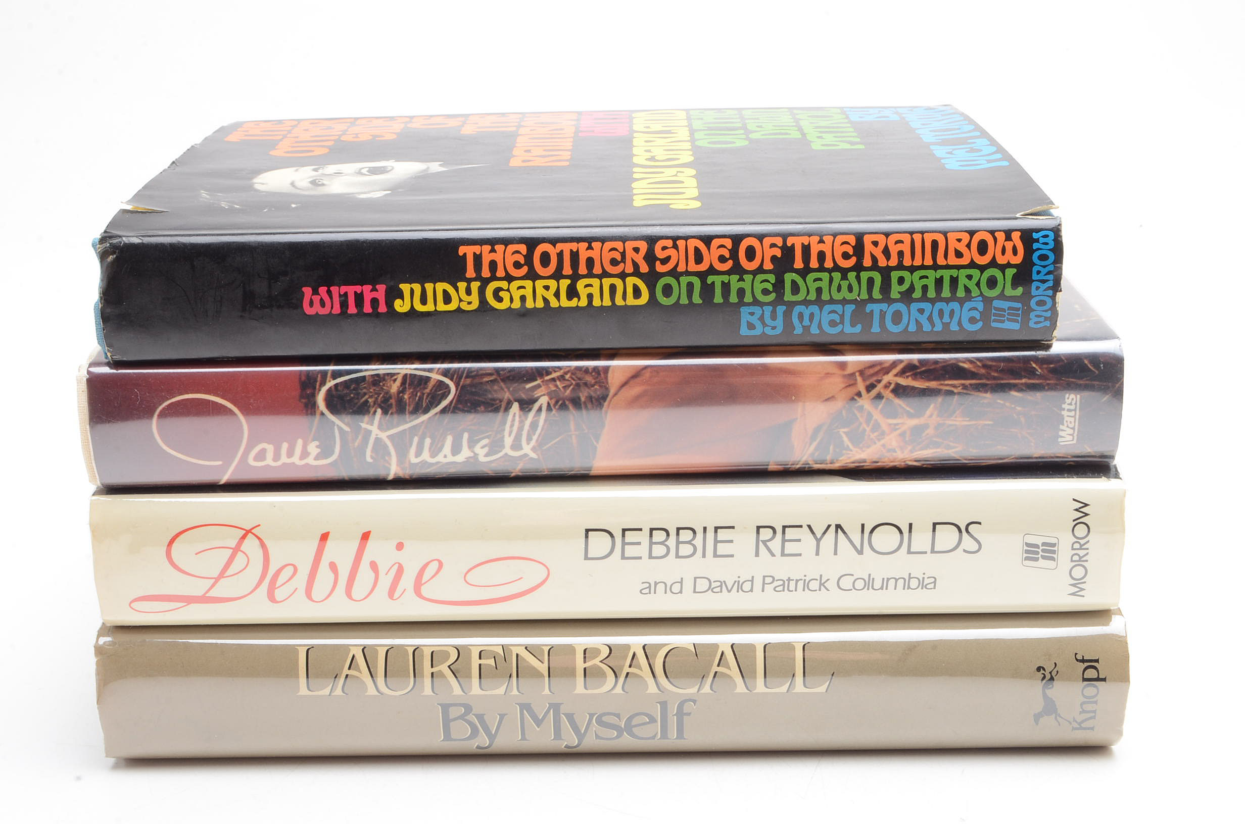 Signed Hollywood Starlet Memoirs including Bacall, Reynolds, and Garland