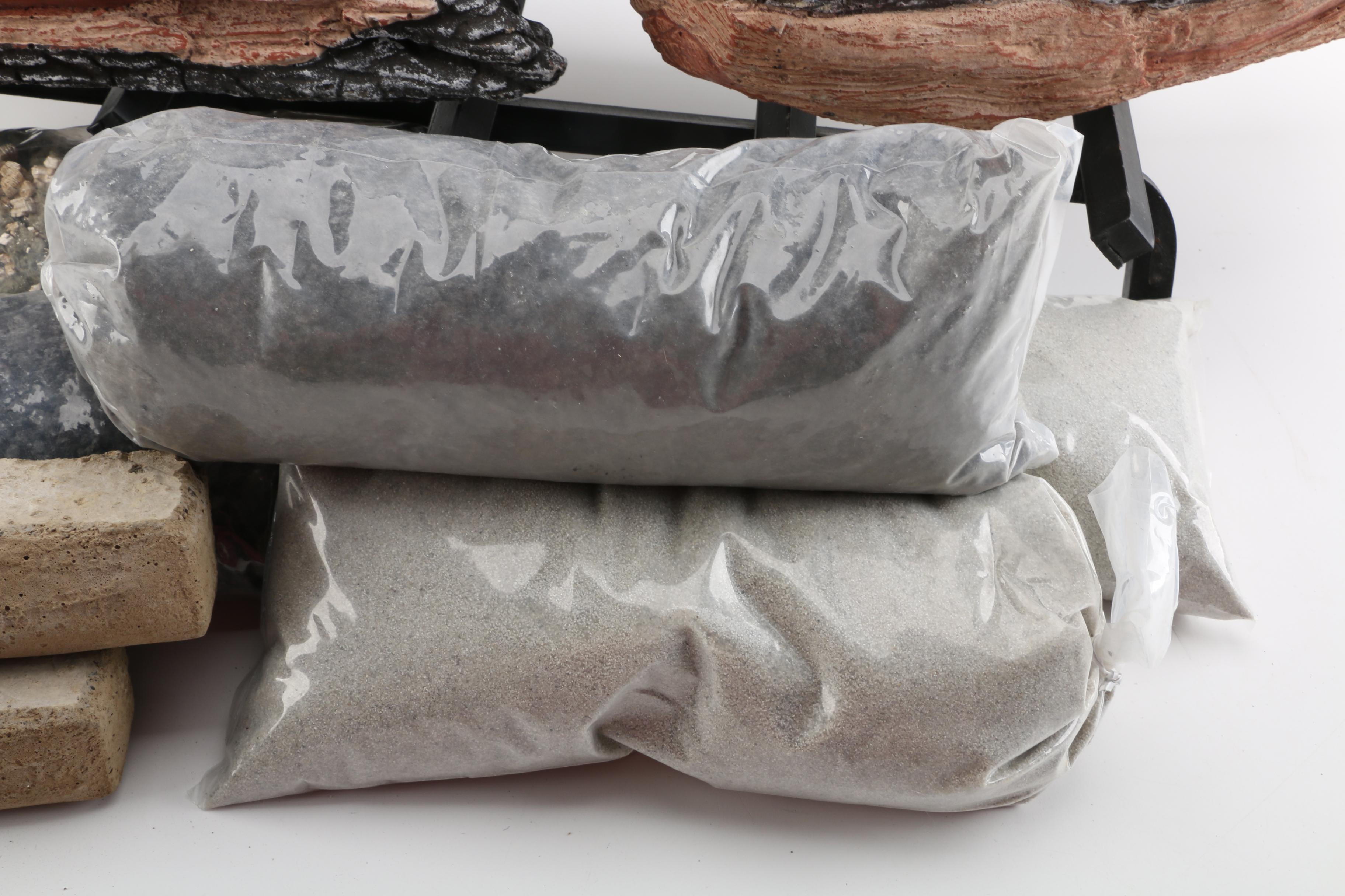 "Rasmussen Flaming Ember Burner" with Logs