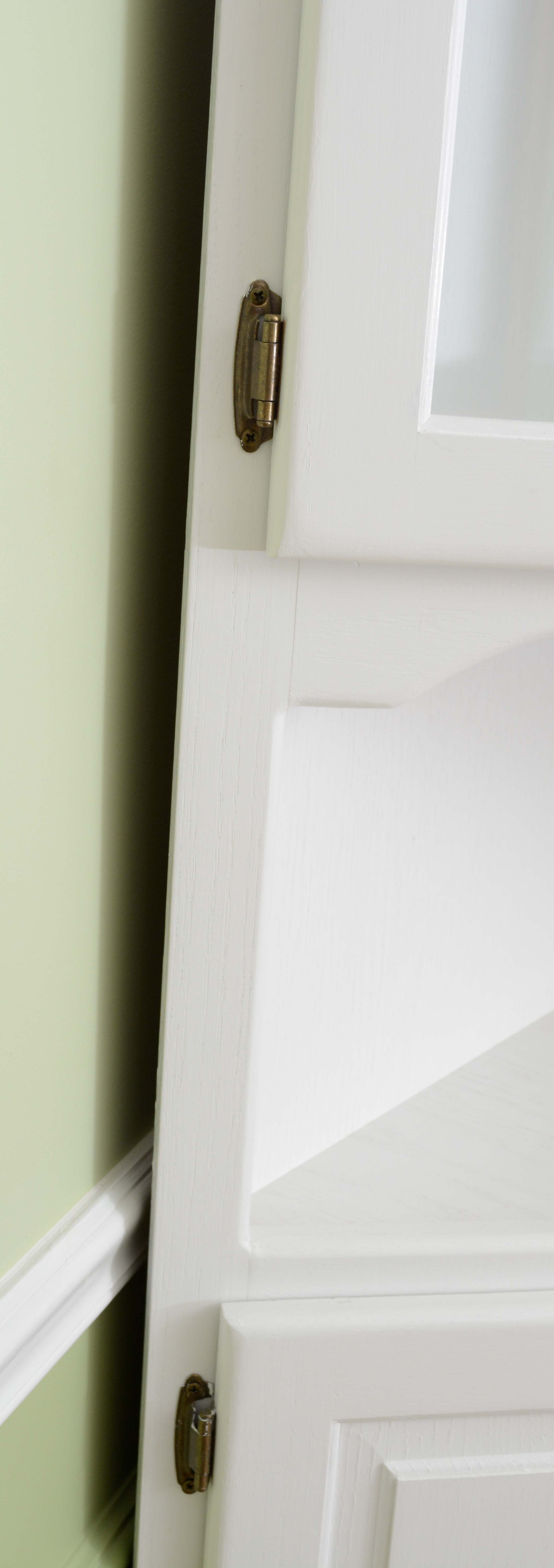 White Painted Wood Corner Cabinet