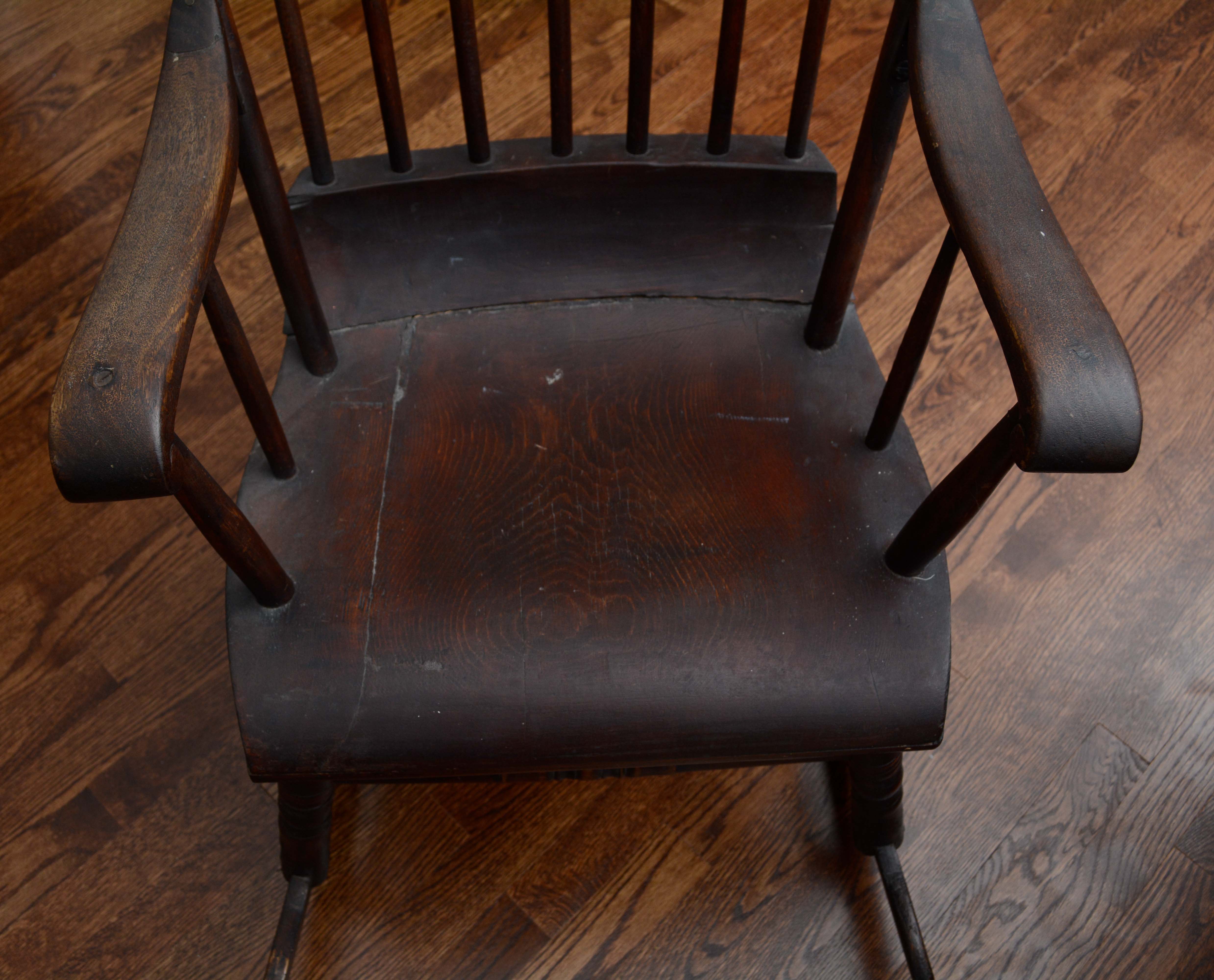 Dark Stained Wooden Rocking Chair