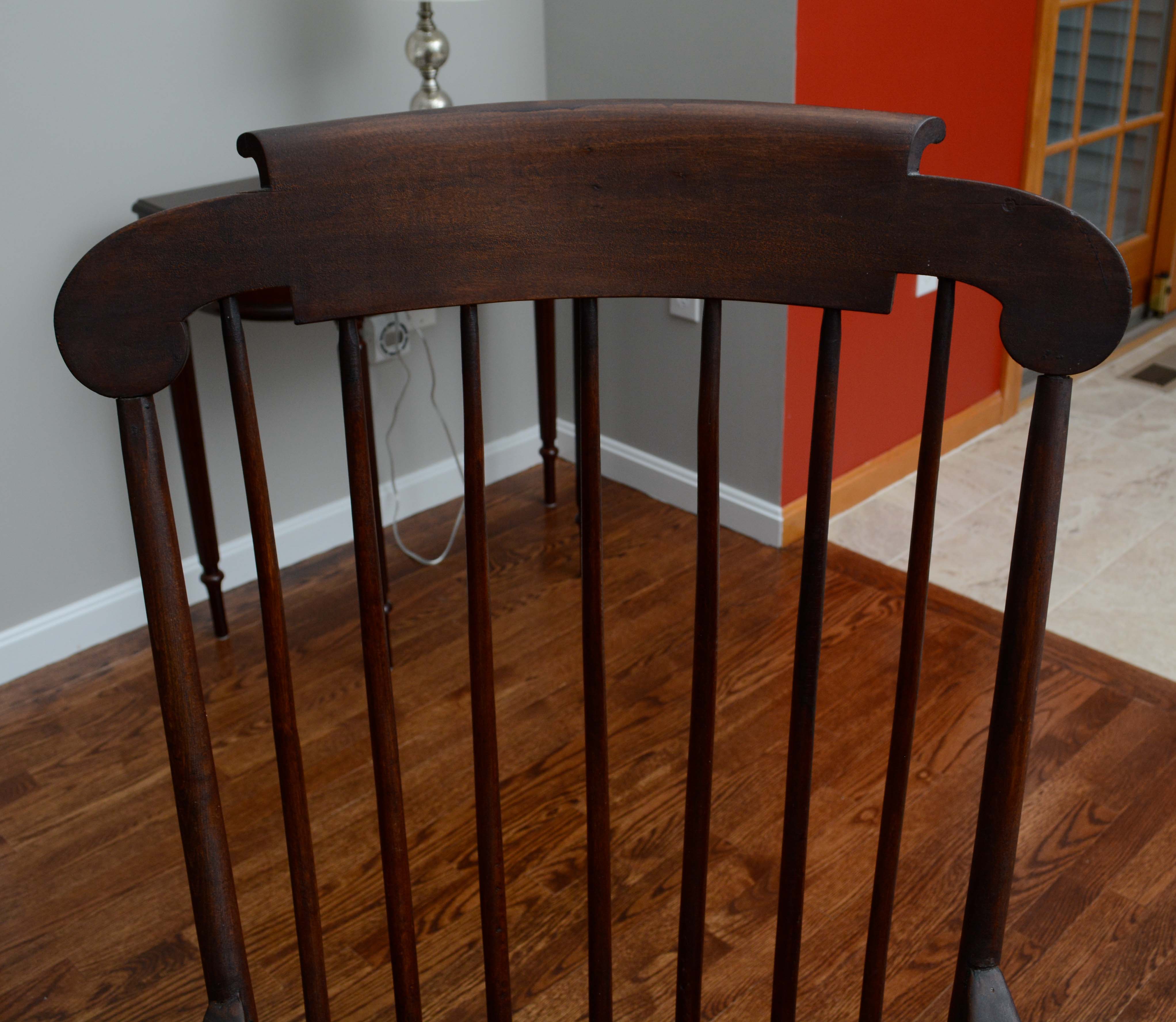 Dark Stained Wooden Rocking Chair