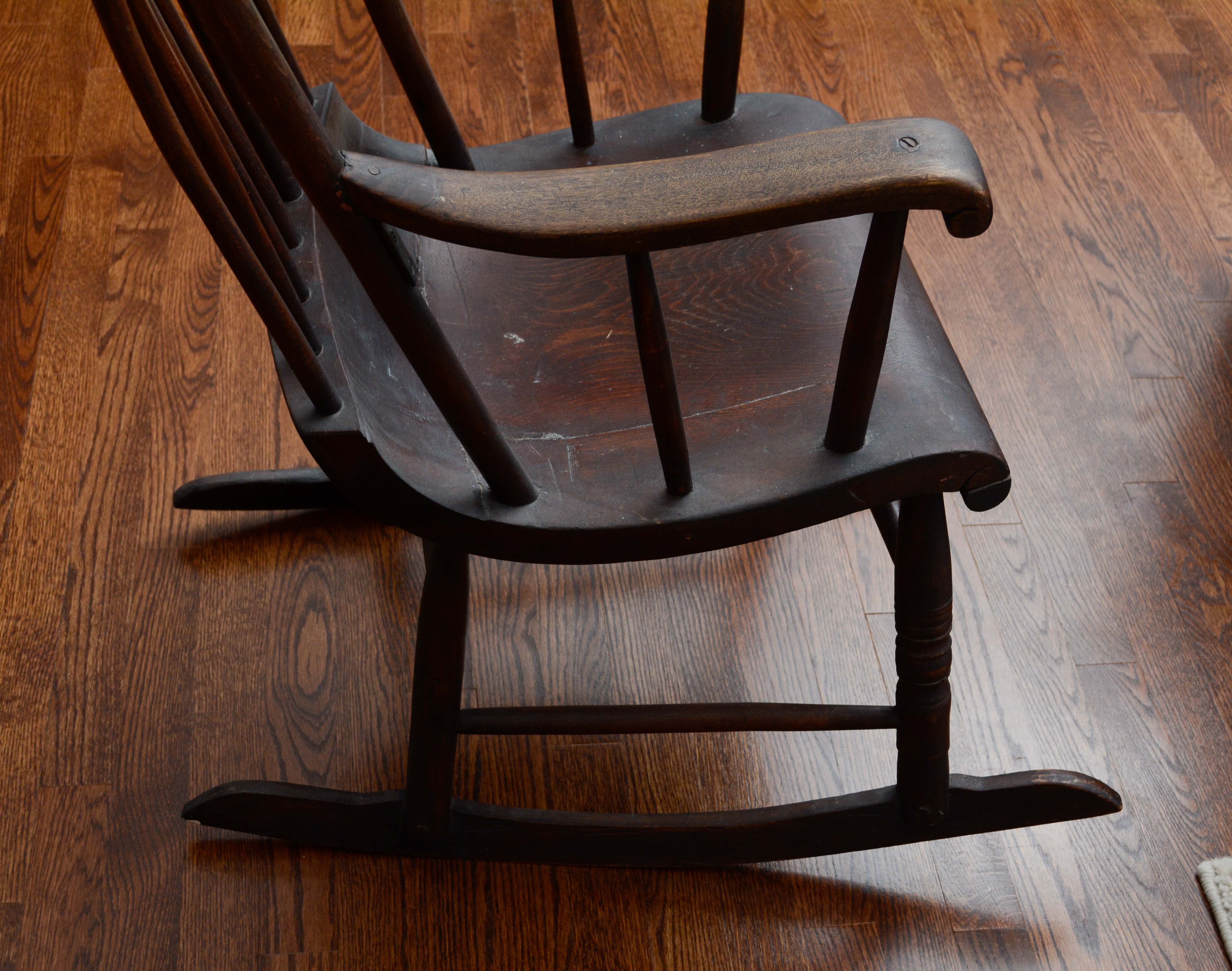 Dark Stained Wooden Rocking Chair