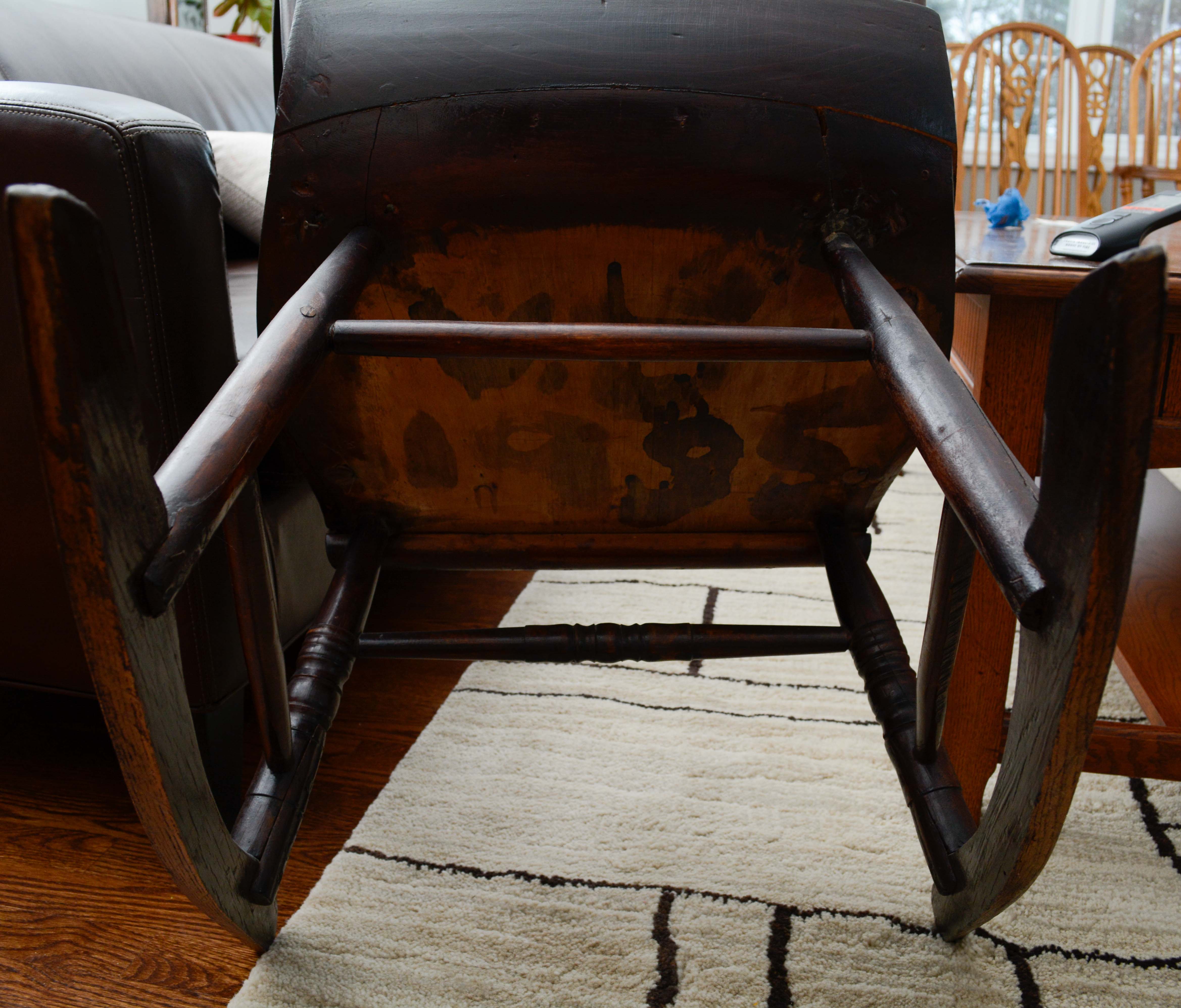 Dark Stained Wooden Rocking Chair