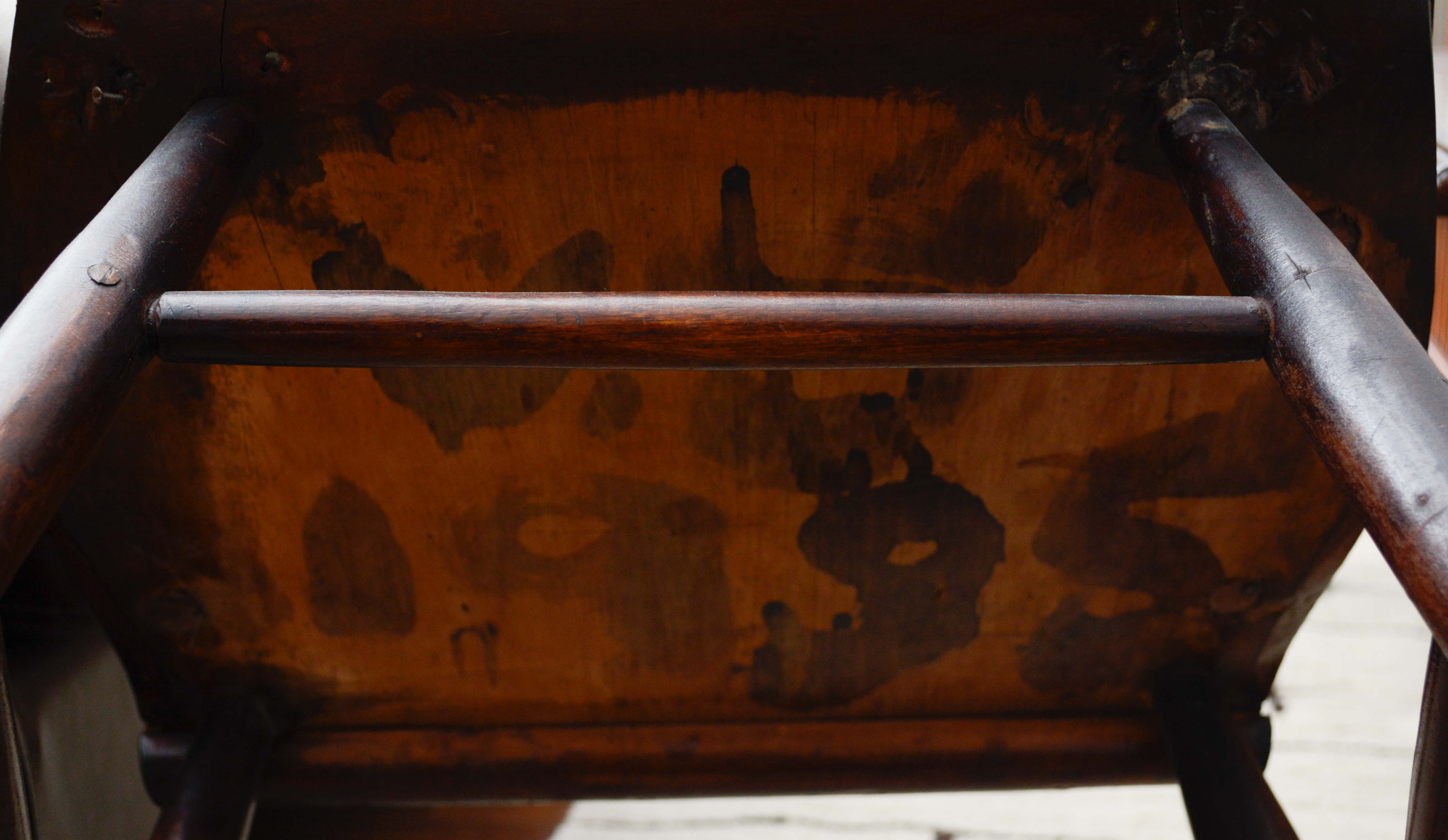 Dark Stained Wooden Rocking Chair