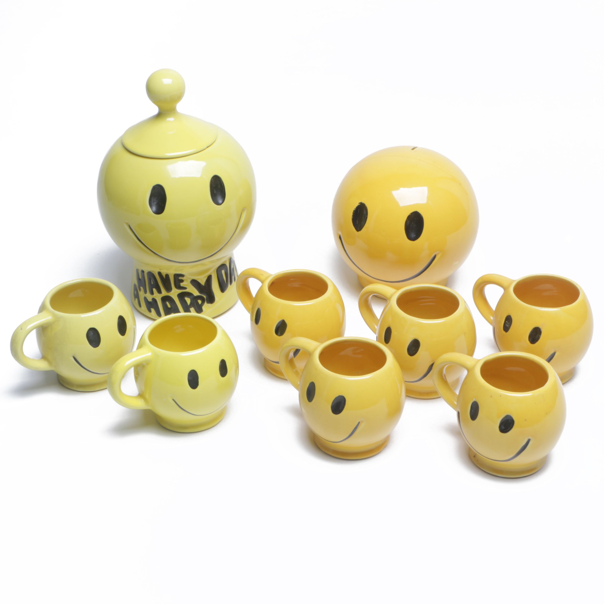 1970s McCoy Pottery "Have a Happy Day" Smiley Face Mugs, Cookie Jar, and Bank