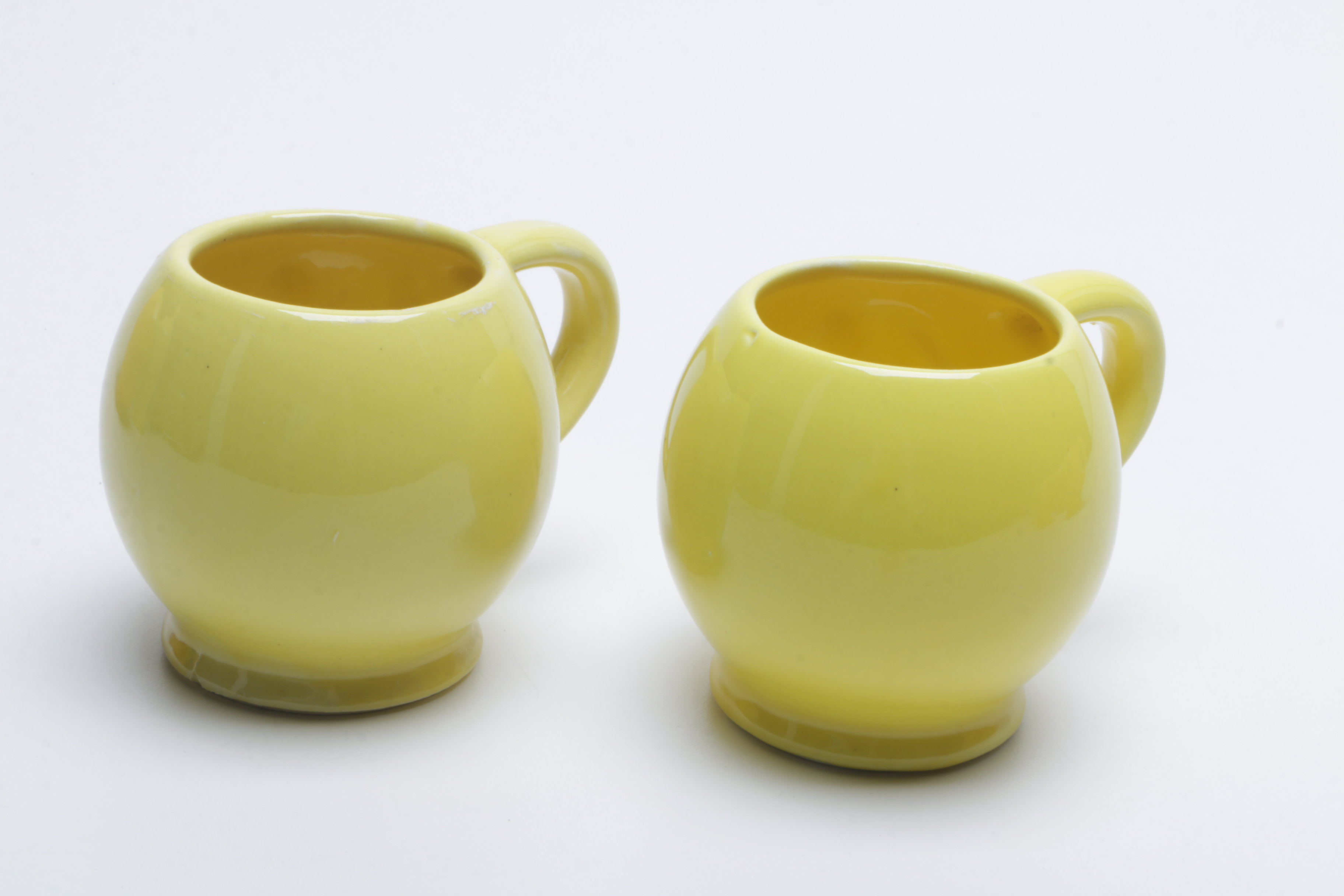 1970s McCoy Pottery "Have a Happy Day" Smiley Face Mugs, Cookie Jar, and Bank