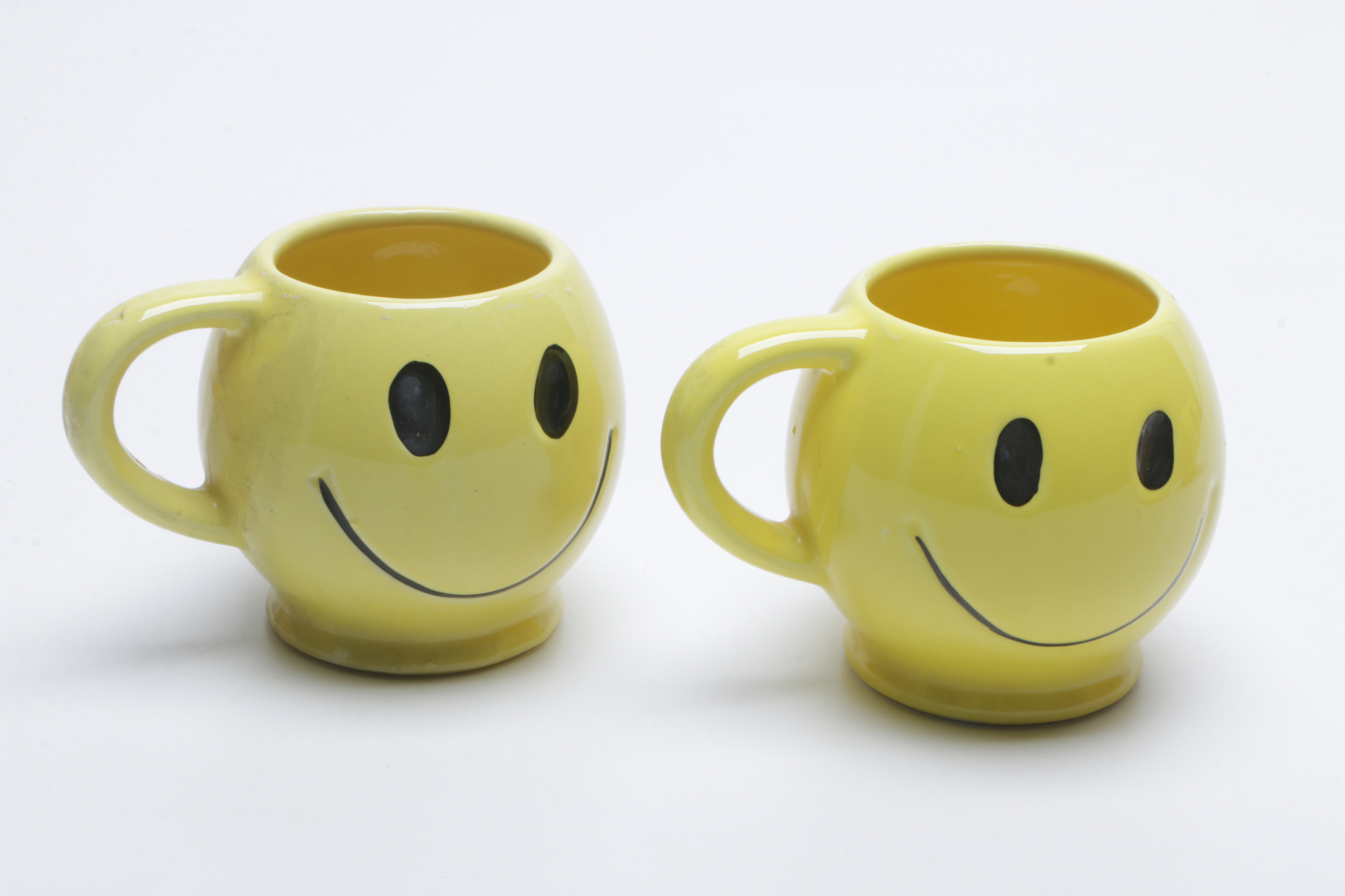 1970s McCoy Pottery "Have a Happy Day" Smiley Face Mugs, Cookie Jar, and Bank