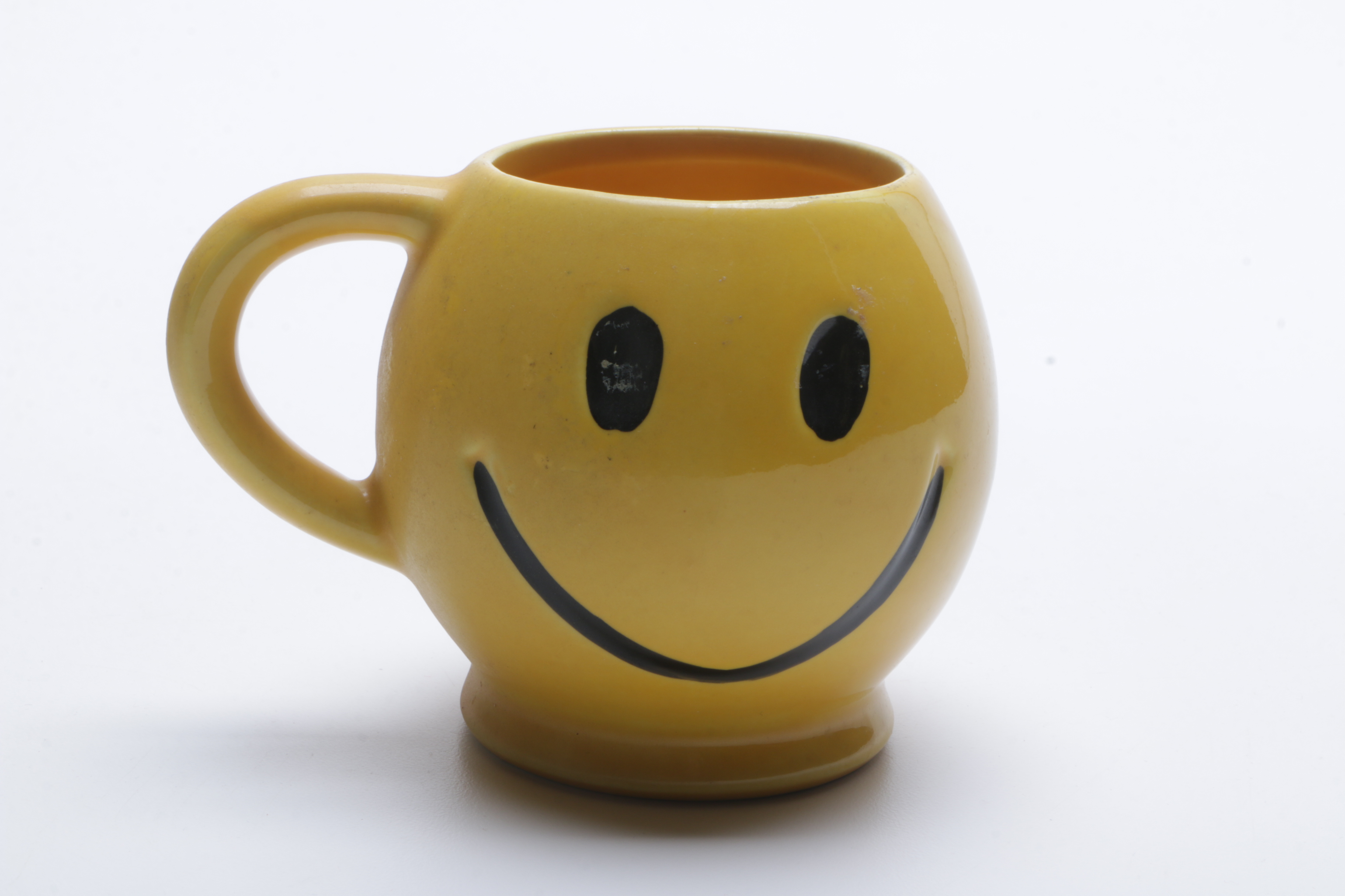 1970s McCoy Pottery "Have a Happy Day" Smiley Face Mugs, Cookie Jar, and Bank