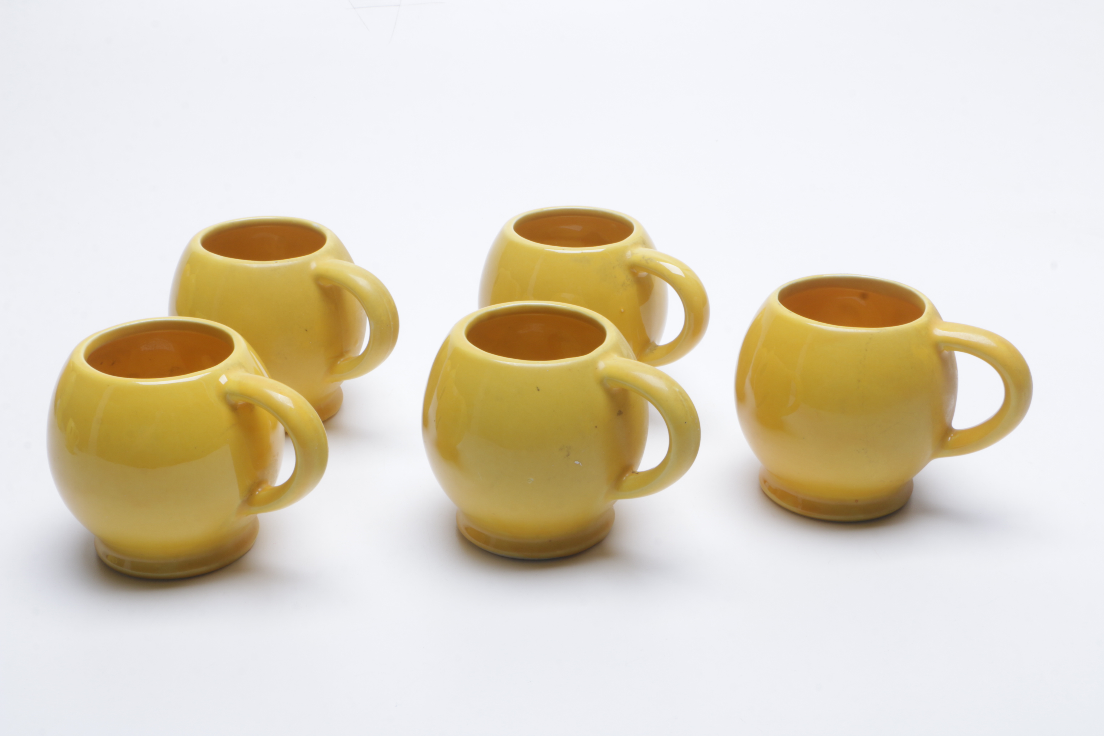 1970s McCoy Pottery "Have a Happy Day" Smiley Face Mugs, Cookie Jar, and Bank