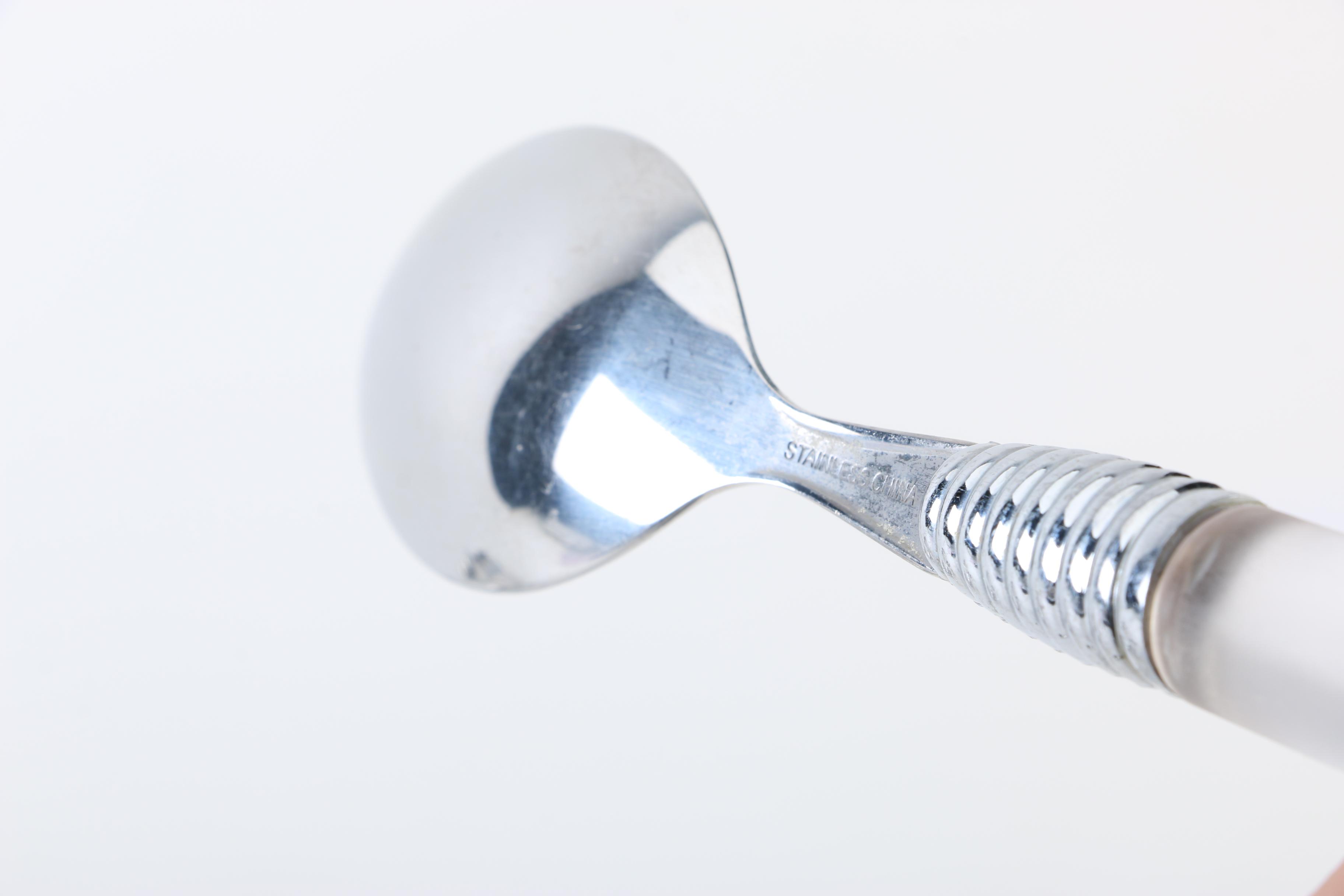 Gibson and Other Stainless Steel Flatware with Plastic Handles