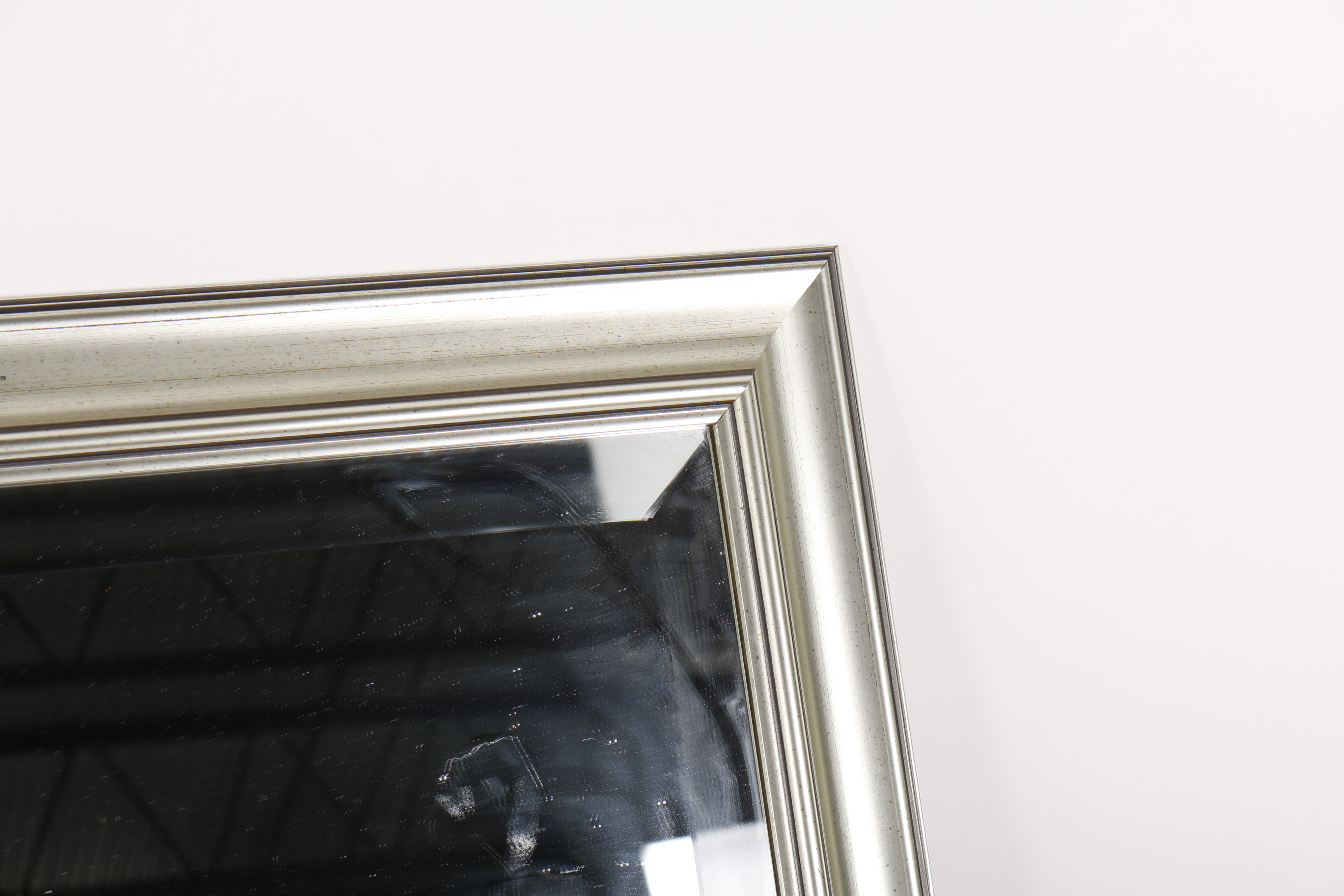 Molded Silver Tone Framed Beveled Wall Mirror