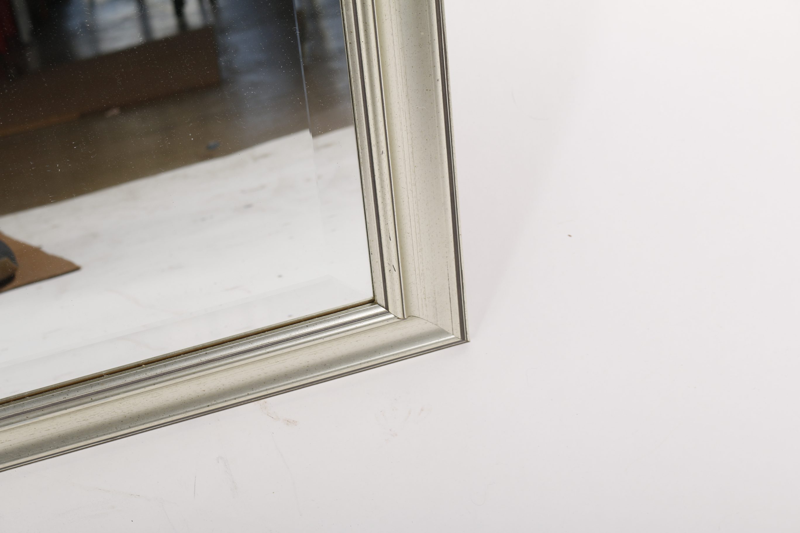 Molded Silver Tone Framed Beveled Wall Mirror