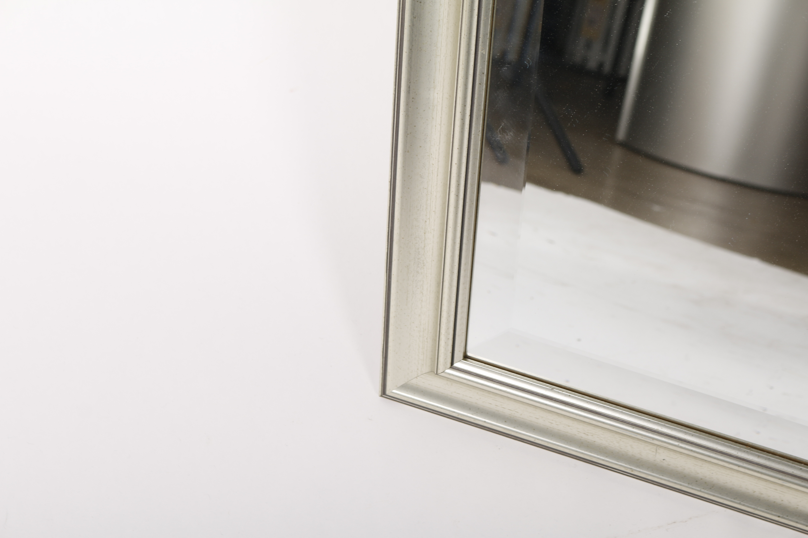Molded Silver Tone Framed Beveled Wall Mirror