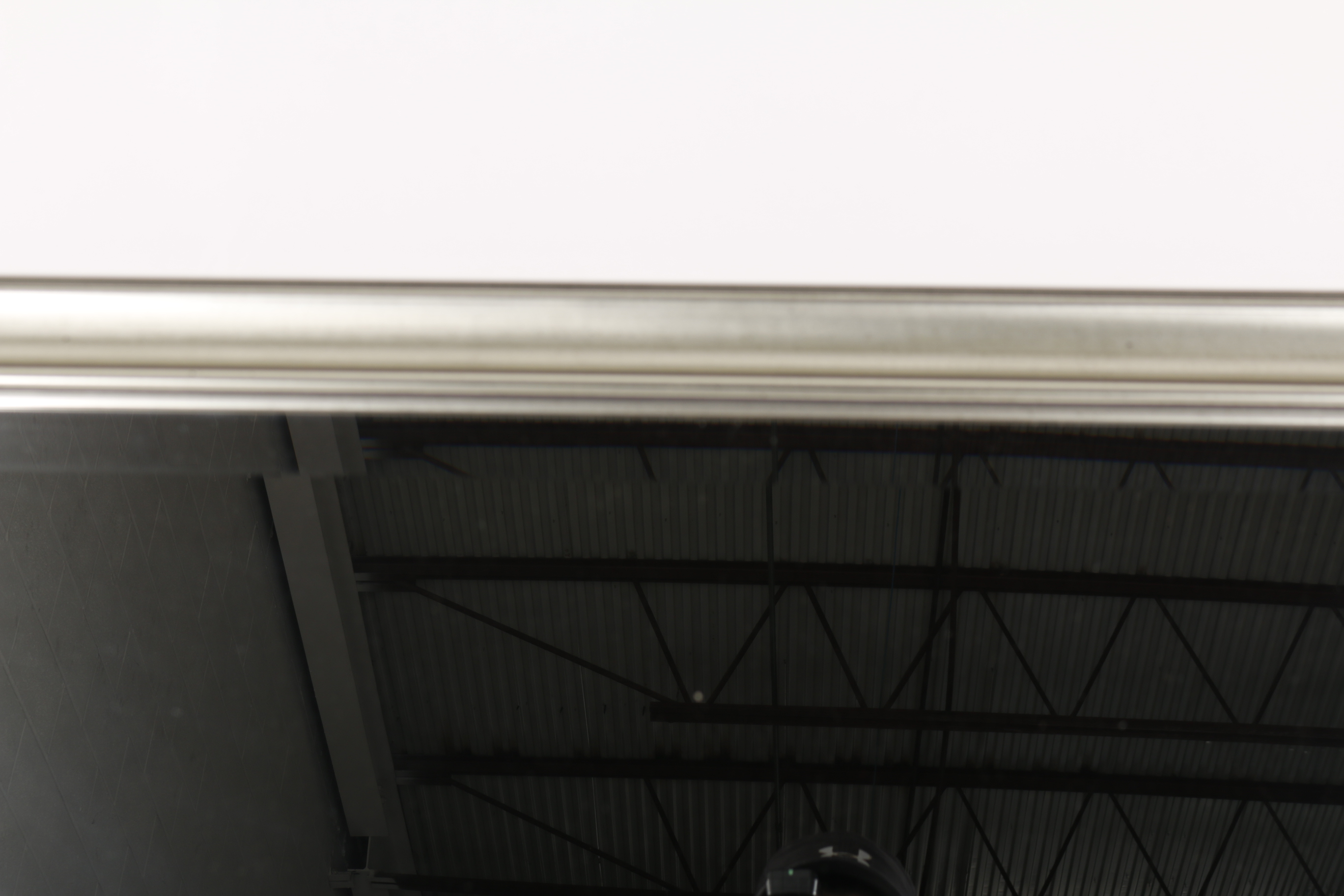 Molded Silver Tone Framed Beveled Wall Mirror